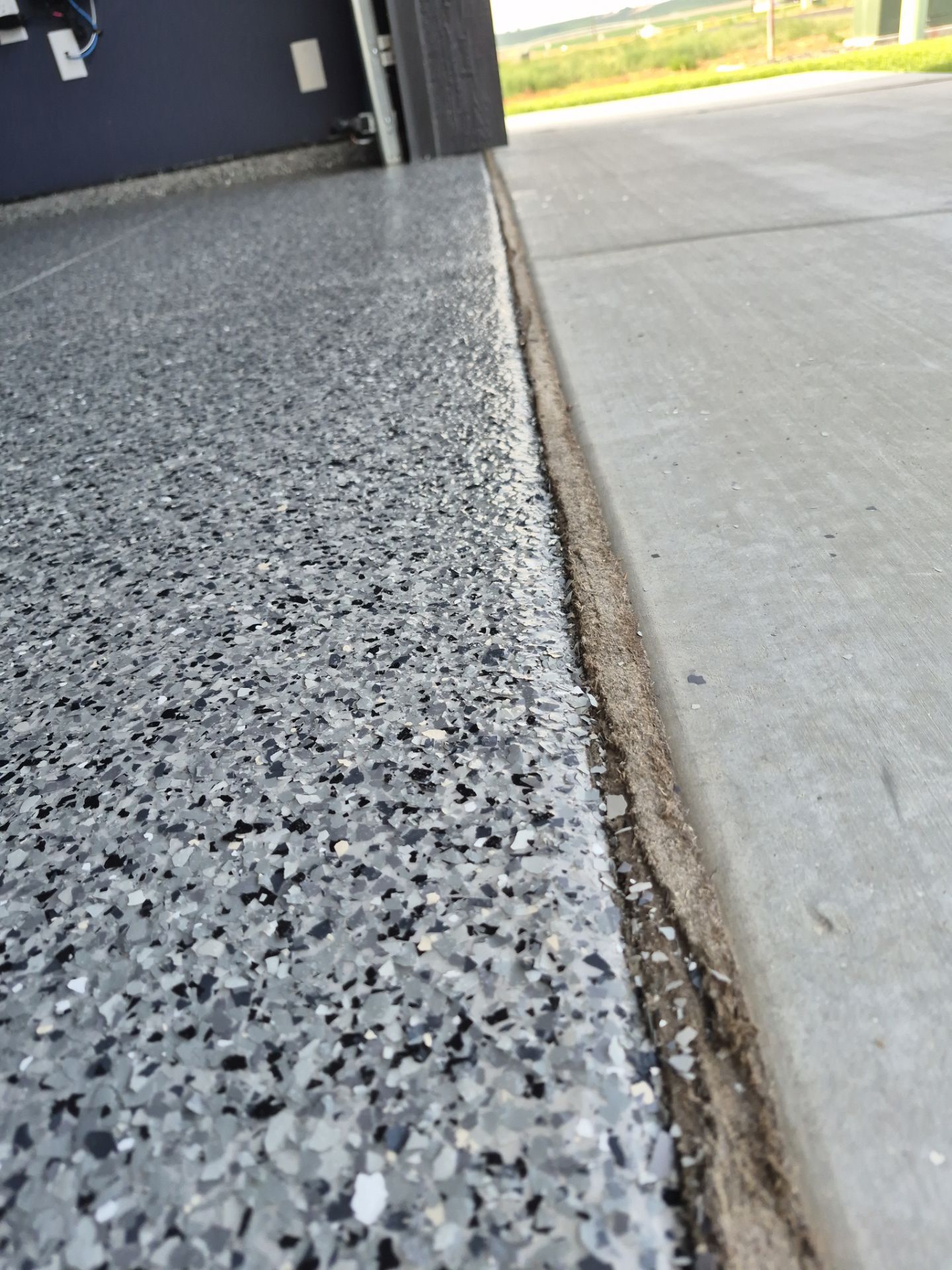 Custom Nightfall Flake Garage Floor Coating in Pasco by Croc Coatings, LLC