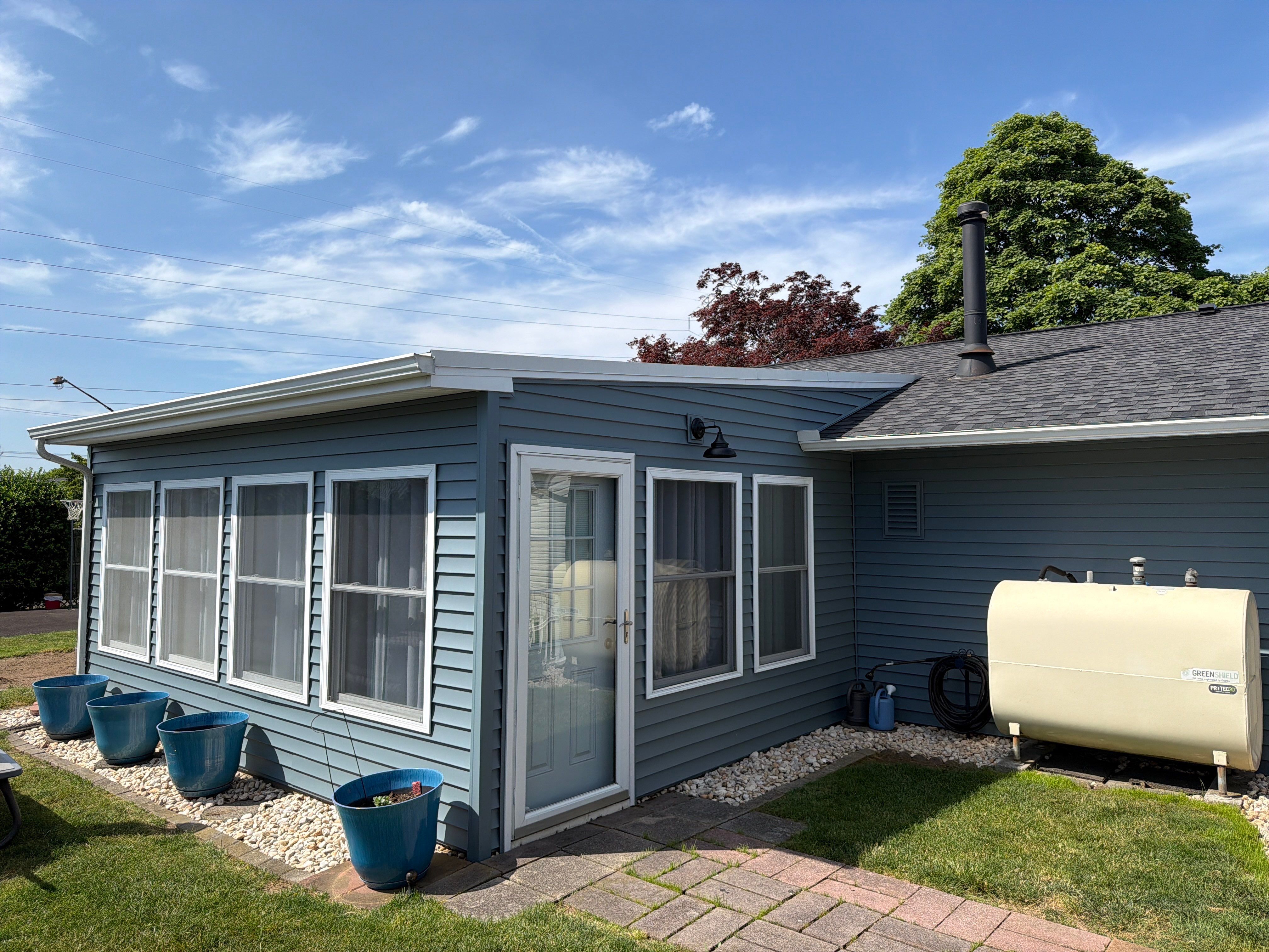 Full Vinyl Siding and Window Replacement in Levittown by Stofan Construction LLC