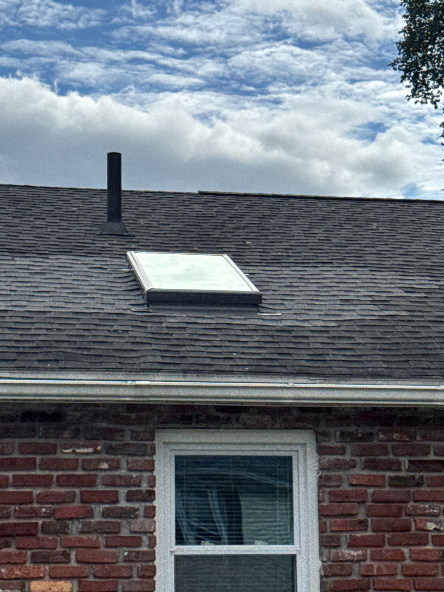 Lowell Premium Velux Curb-Mount Skylight & Chimney Restoration by Mighty Dog Roofing of Greater Middlesex County