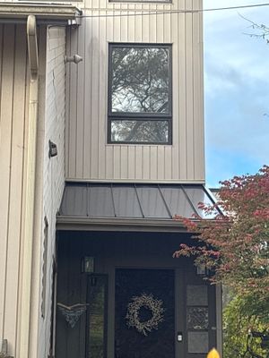 New Shingle Roof with Metal roof accents