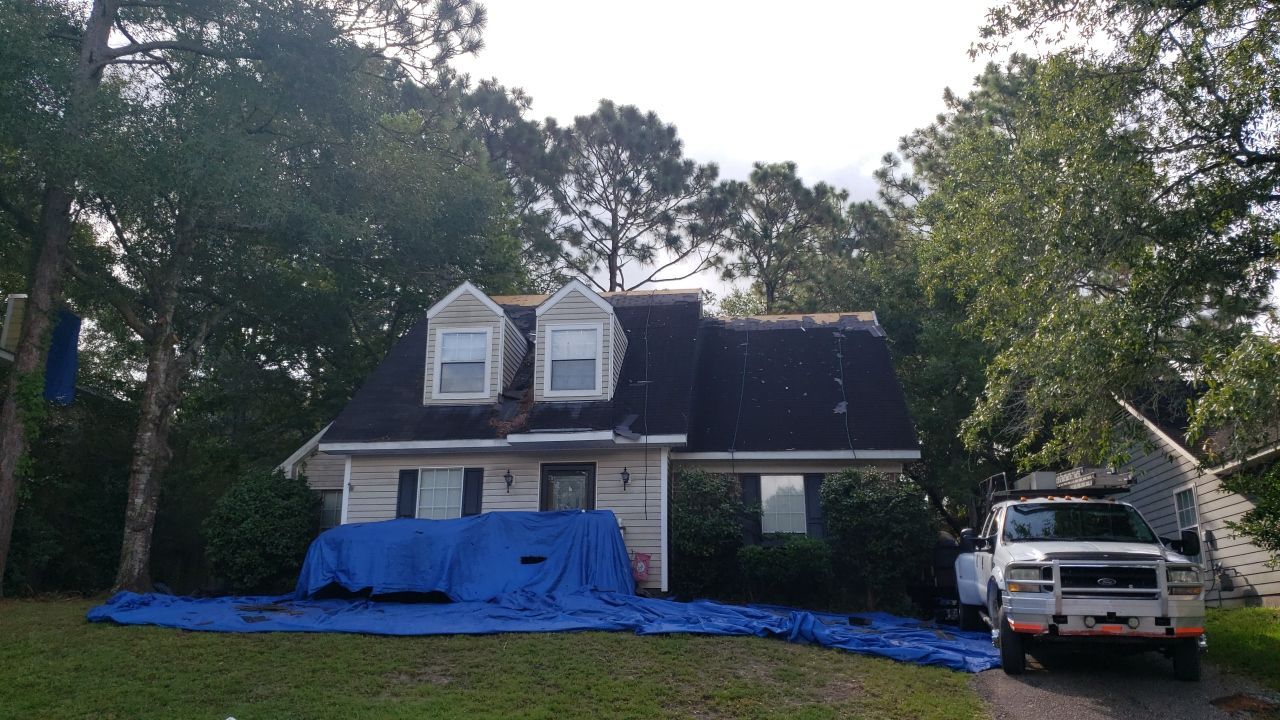 Residential Roofing Installation using Roof Replacement by American Roofing & Construction LLC