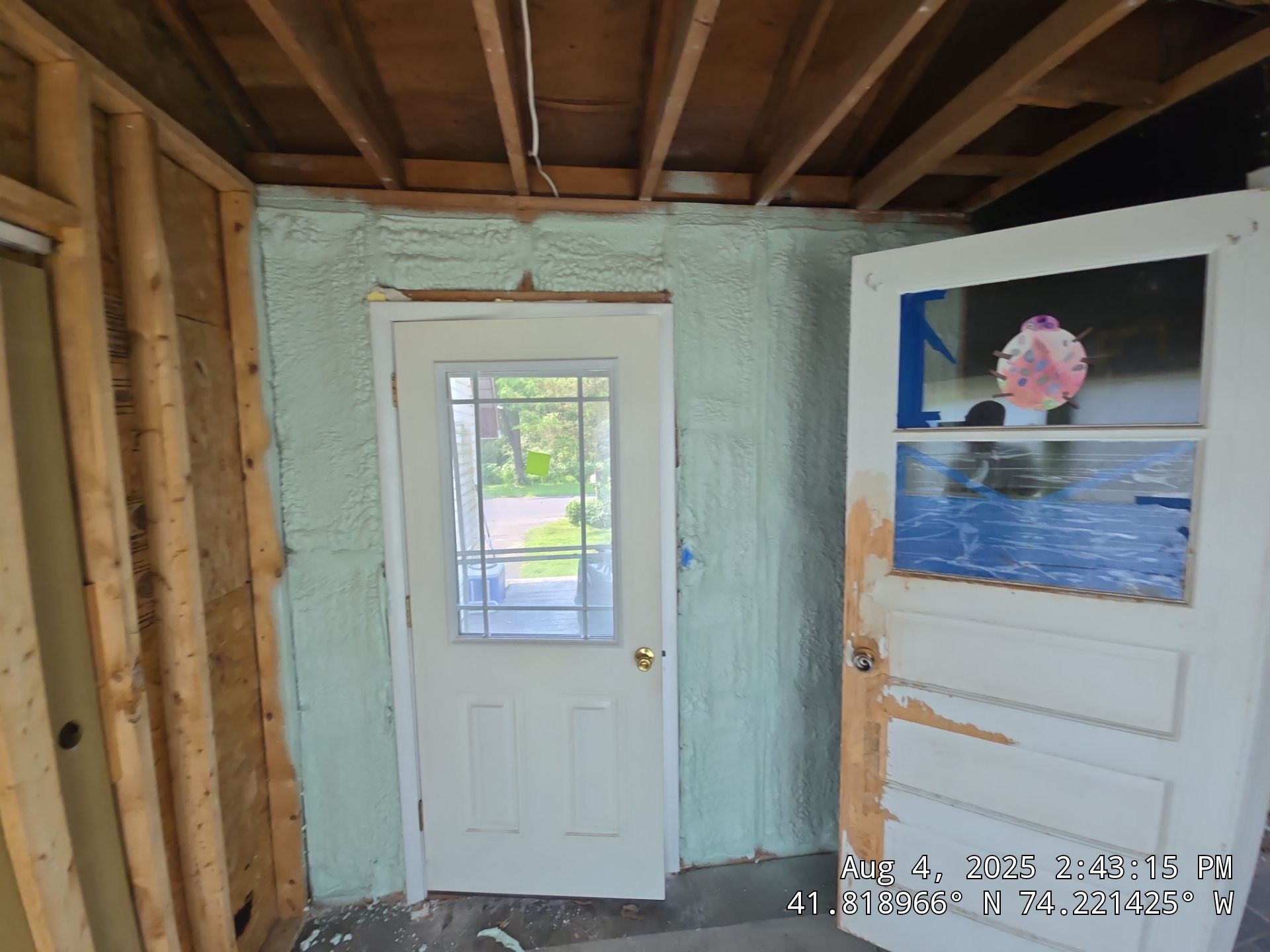 Master bedroom Exterior Walls using open cell spray foam by NYS Foam & Energy