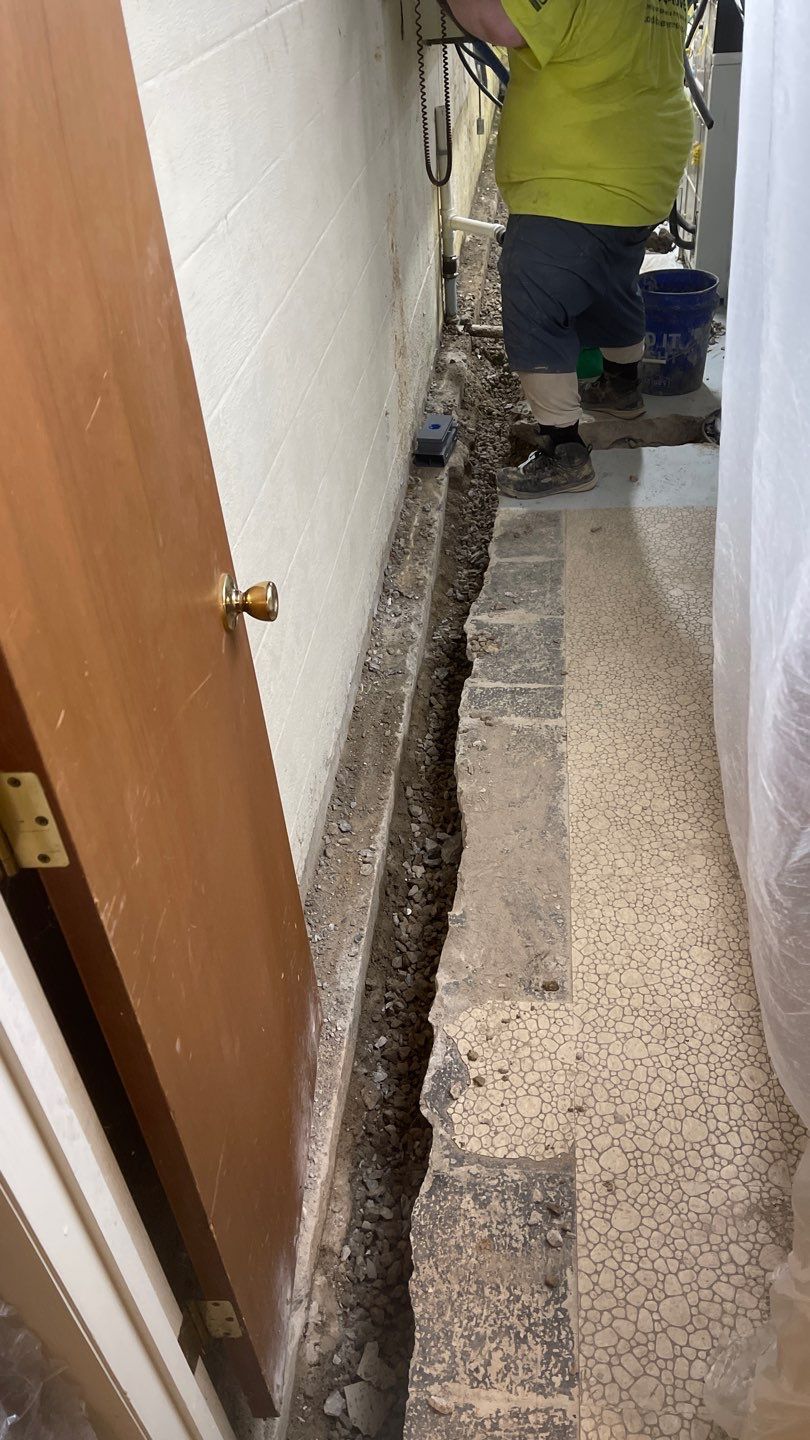 Interior Waterproofing Using GrateDrain™ Products by Toledo Basement Repair