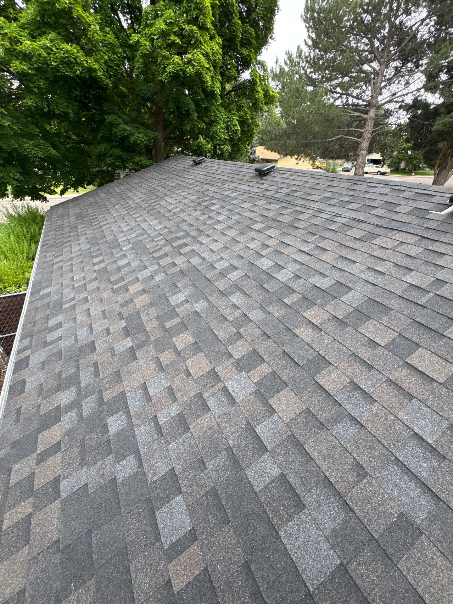 Residential Roof Replacement With Dark Gray Architectural Shingles in Mountain Home by Olive Roofing