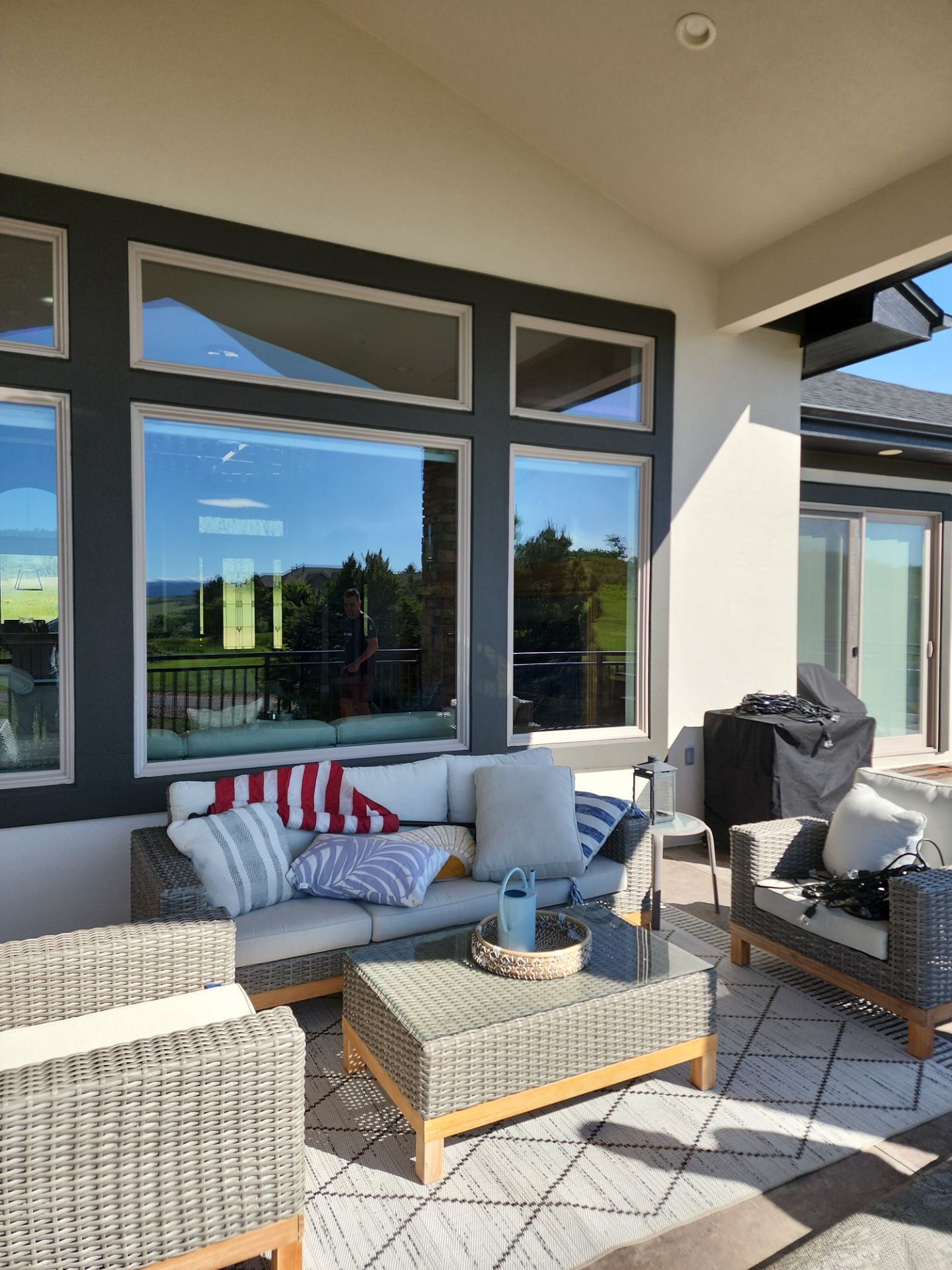 Castle Rock Elegance: White Stucco Exterior with Bold Tricorn Black by J&M Painting LLC
