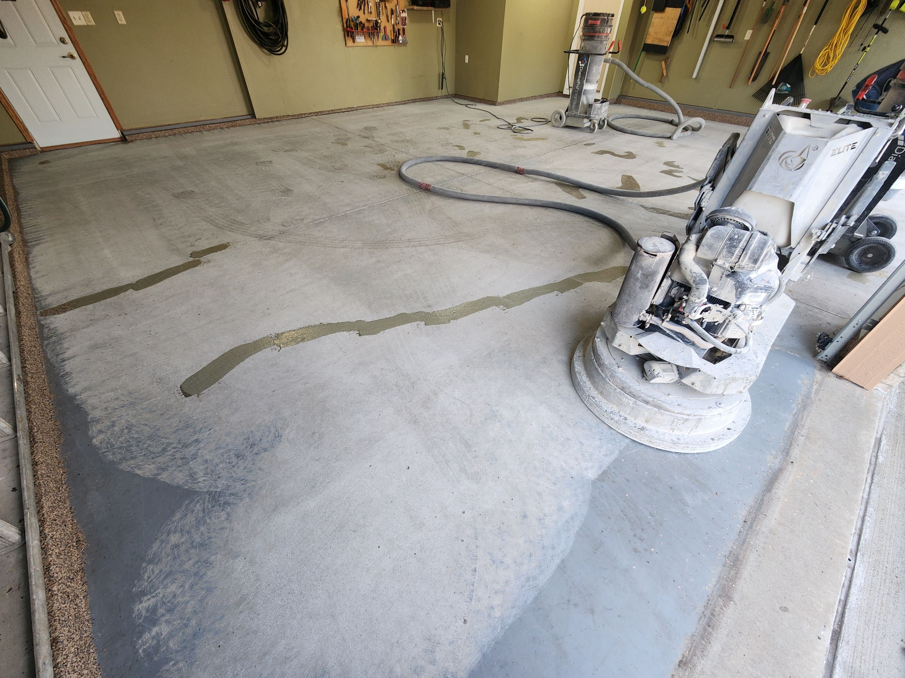 Sioux Falls Garage Floor Concrete Coating with Textured Aggregate by Select Painting, Coatings & Garage Cabinets