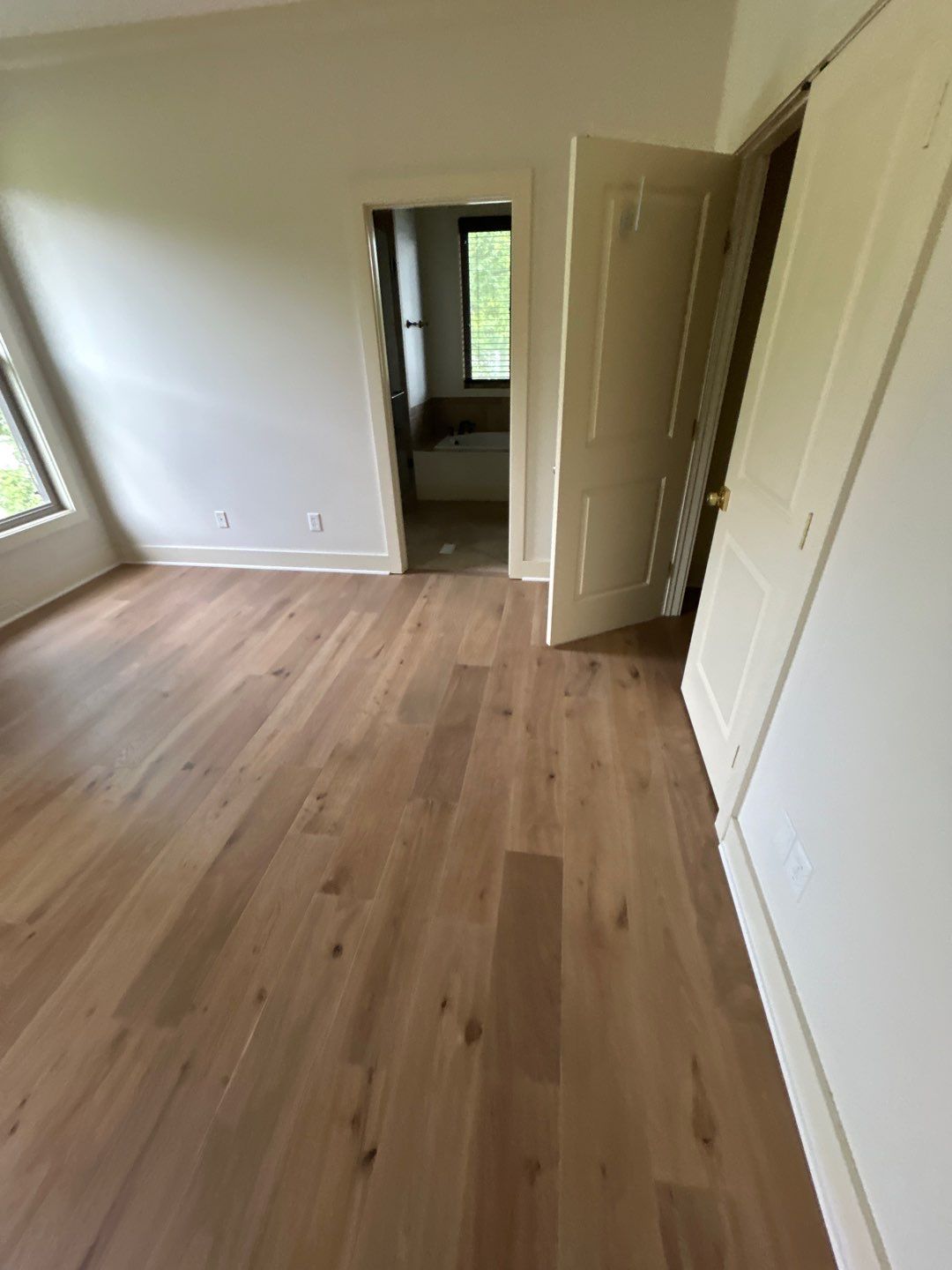 White Oak Hardwood and Checkerboard Tile Installation by Footprints Floors of Nashville