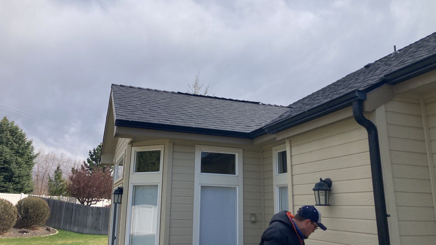 Beautifully maintained two story home with Duration Onyx Black located in Meridian by ID Roofing LLC