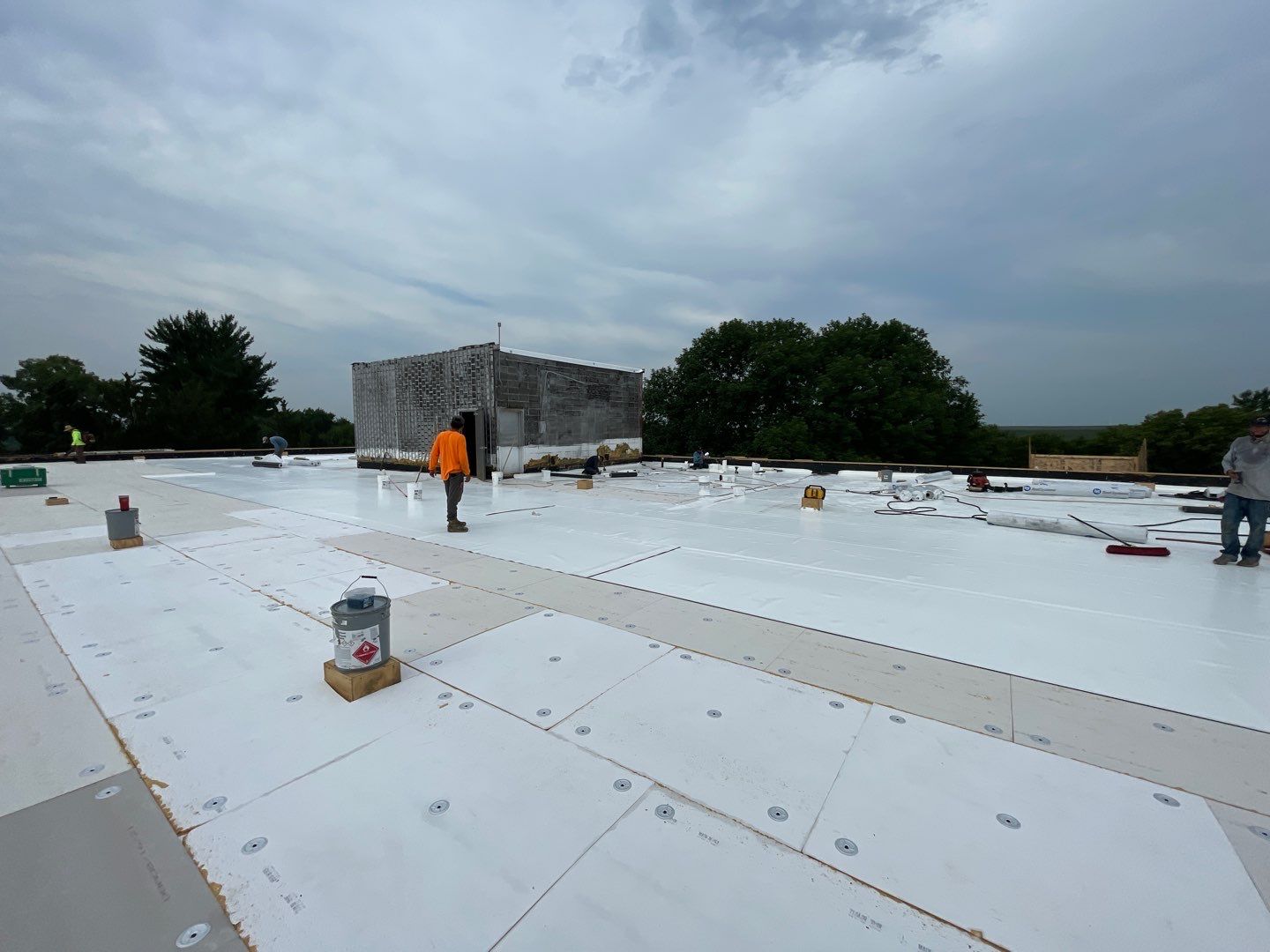 Commercial Flat Roof IB PVC Install  by Titan Commercial & Residential Roofing 