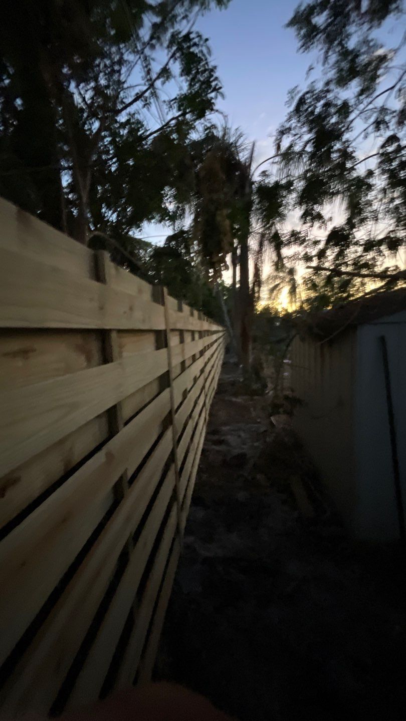 Wood Fence Installation using Horizontal Shadowbox Wood Privacy Fence by Asap fence and gates, LLC