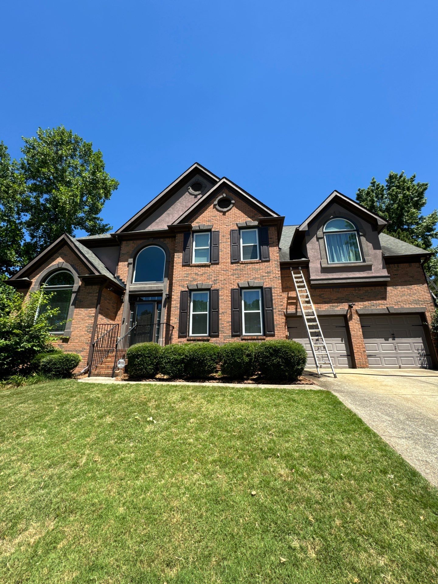 Full Exterior Painting and Gutter Replacement for Powder Springs Home by Swift Home Renovations