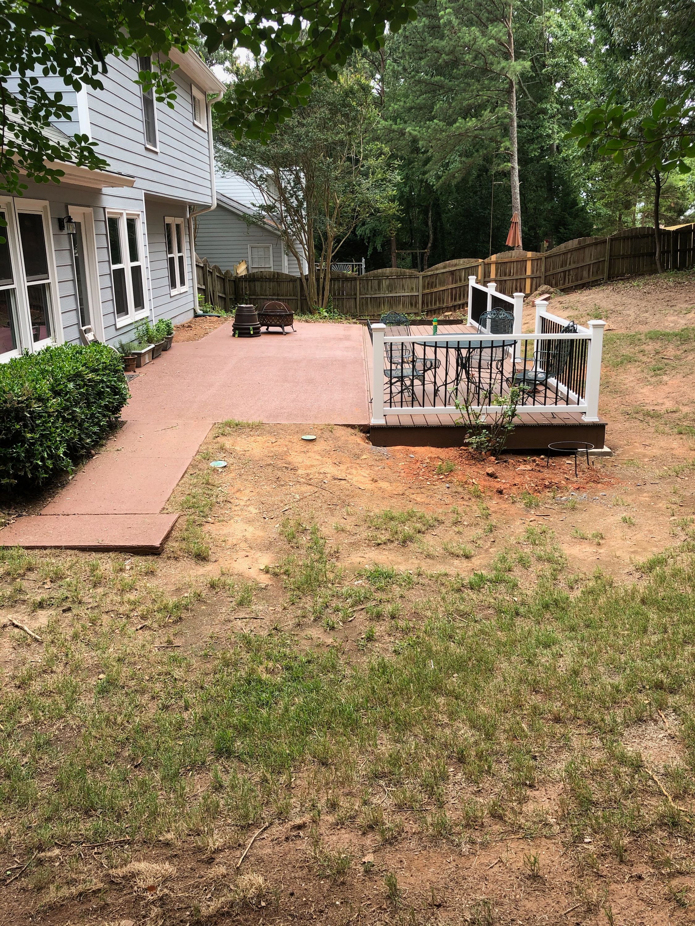 Composite Deck Replacement with White Railings in Duluth by Swift Home Renovations