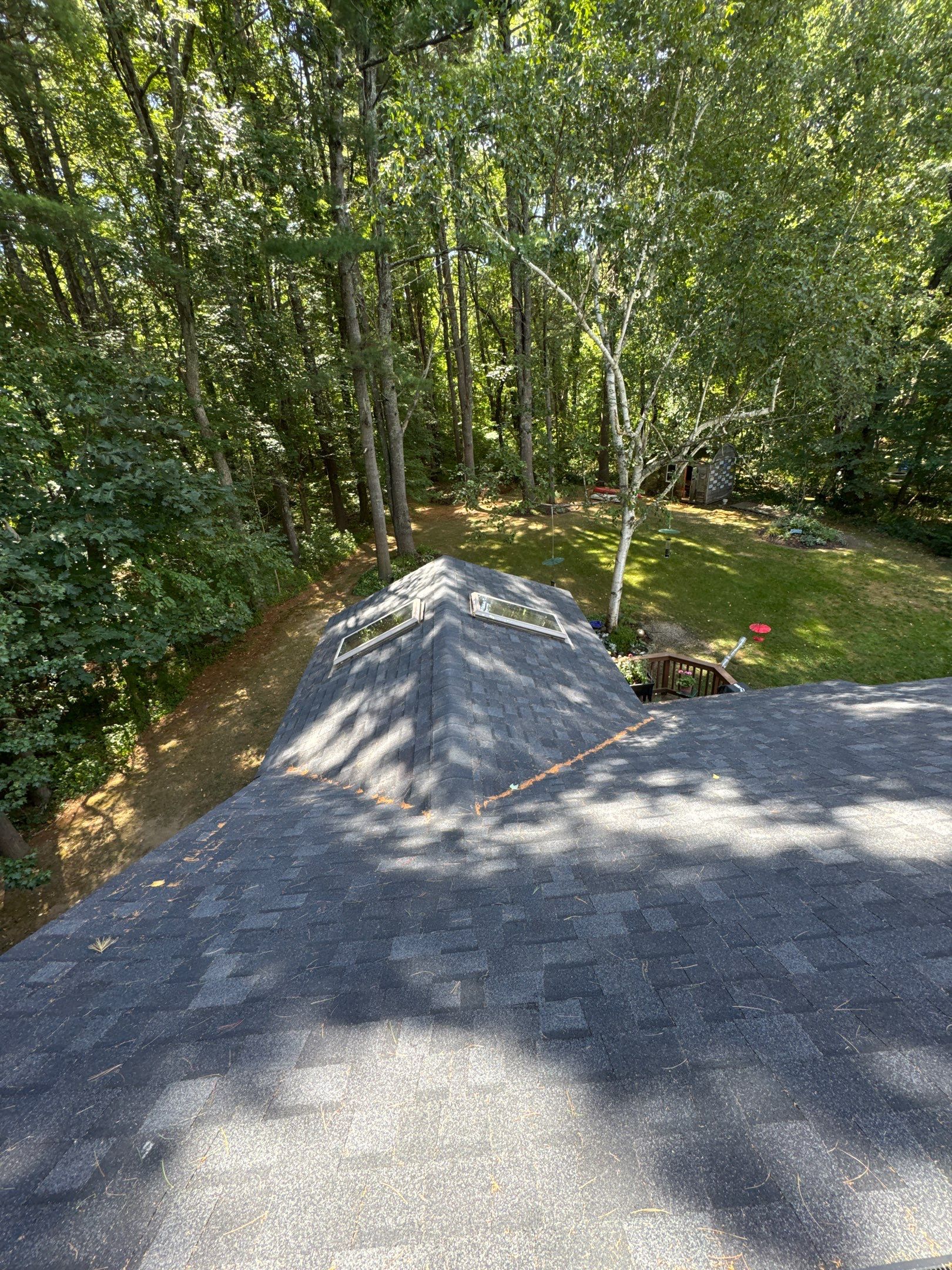 Roof Replacement in Stratham, NH - OC Onyx Black w/ Black Drip Edge by Compass exteriors