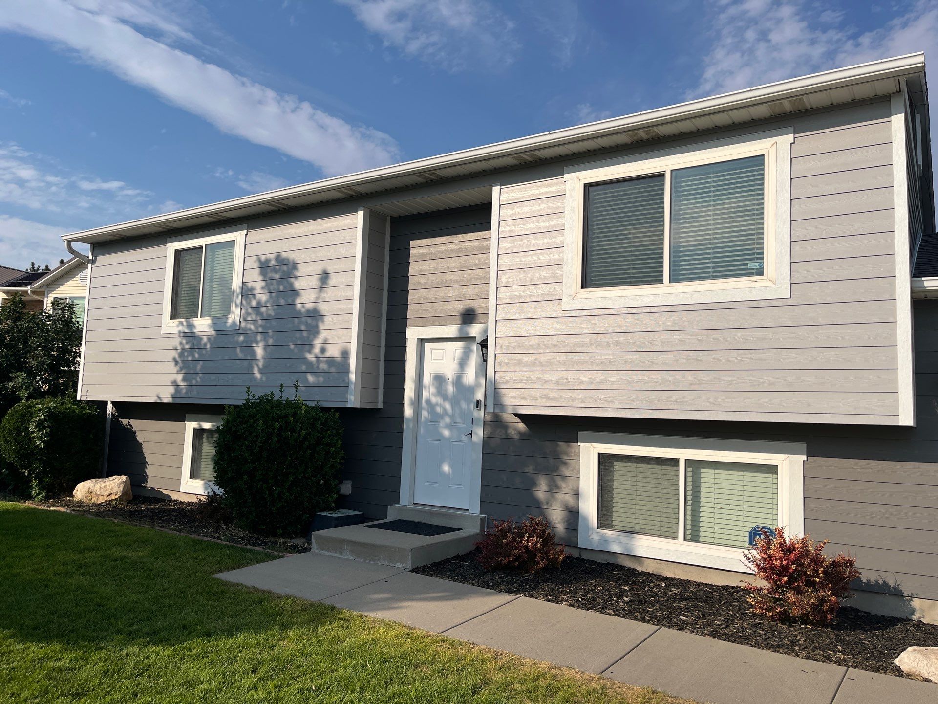 Salt Lake City | Mixed Profile Hardie Upgrade | Arctic White & Iron Gray by Ideal Siding Utah
