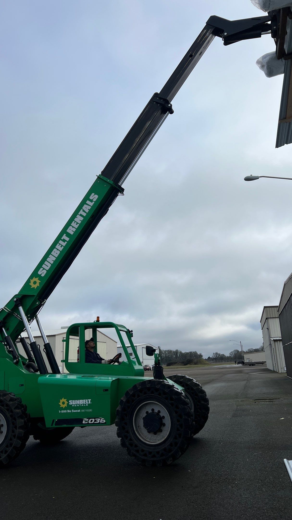 Airport Hanger Metal Roof Replacement and Insulation by Villegas Remodeling, LLC