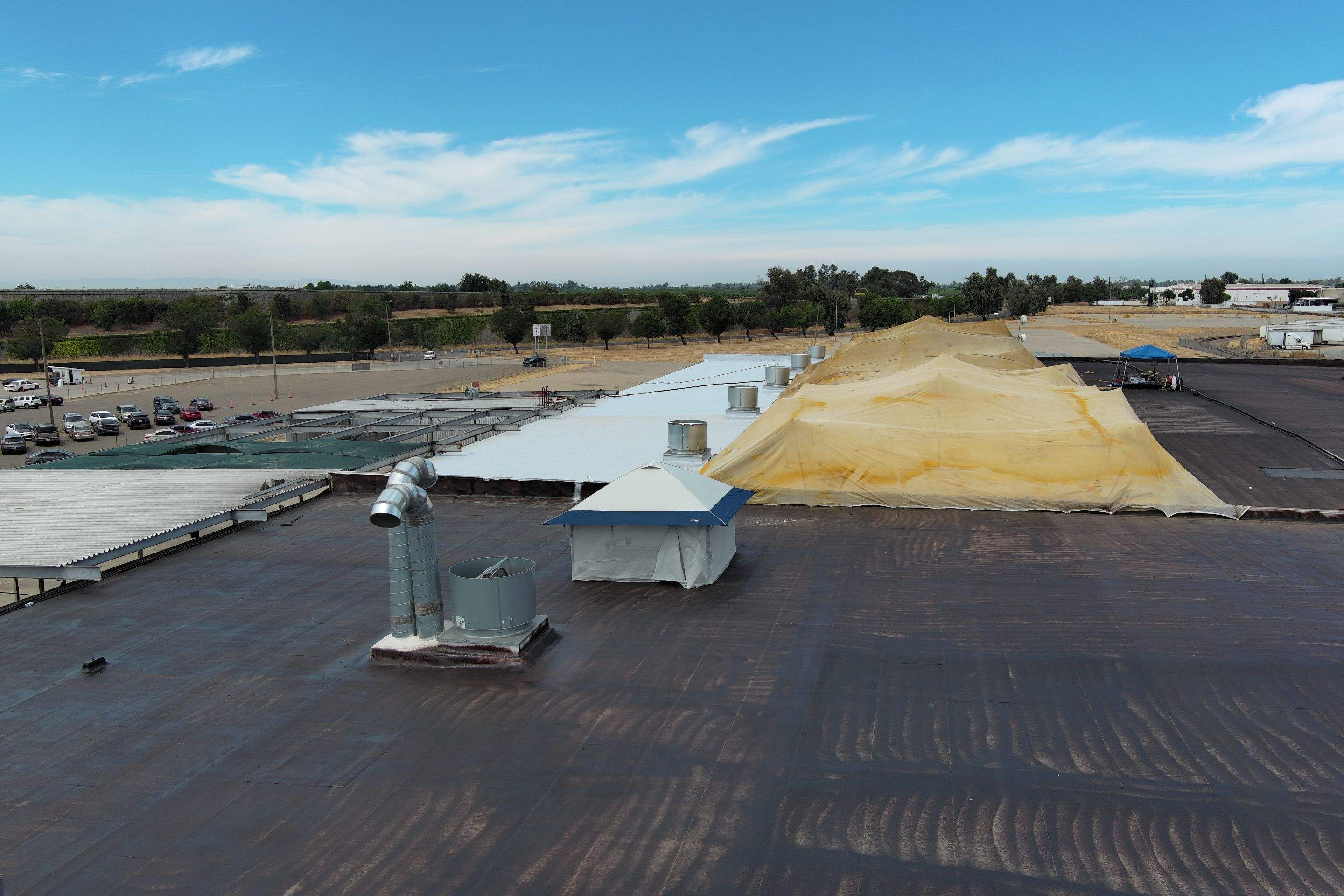 Pro Farms Spray foam roofing project by Straight Edge Roofing Inc