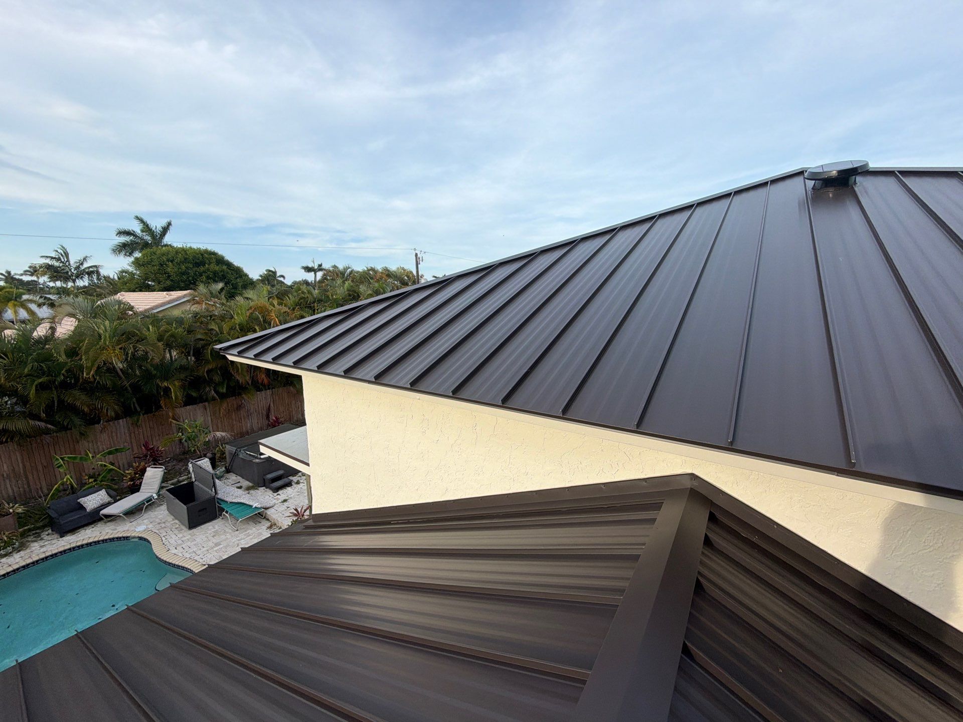 Residential Roofing Installation using 1.5'' Mechanical Seam by BLUES BROTHERS ROOFING