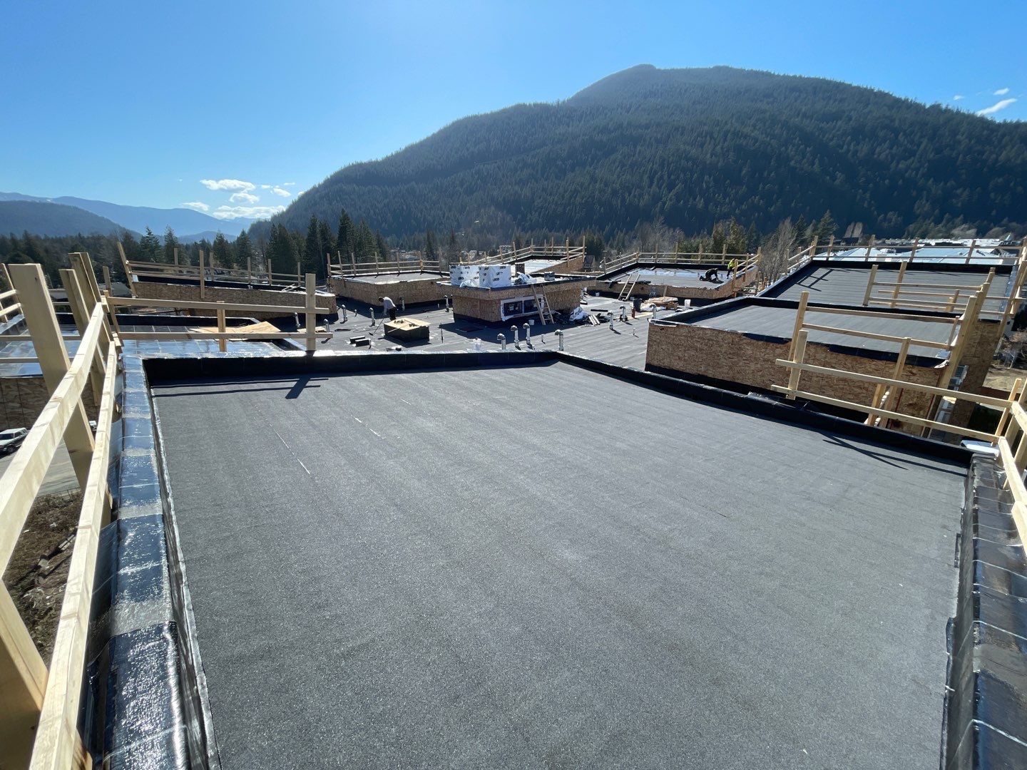Commercial Roofing Installation using IKO 2ply sbs  by Top Notch Roofing Inc