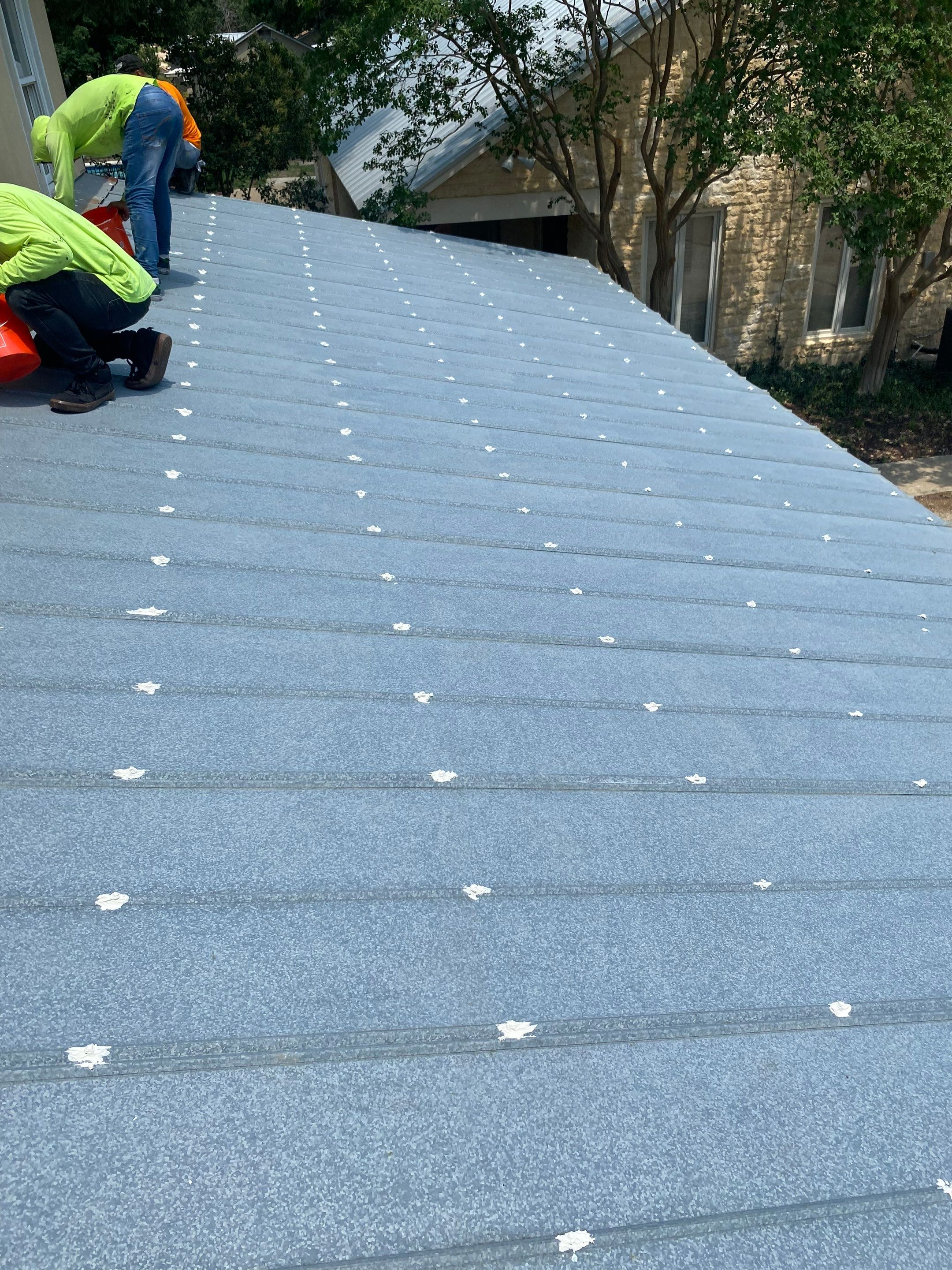 Metal roof clean & coating by Cool Roofs