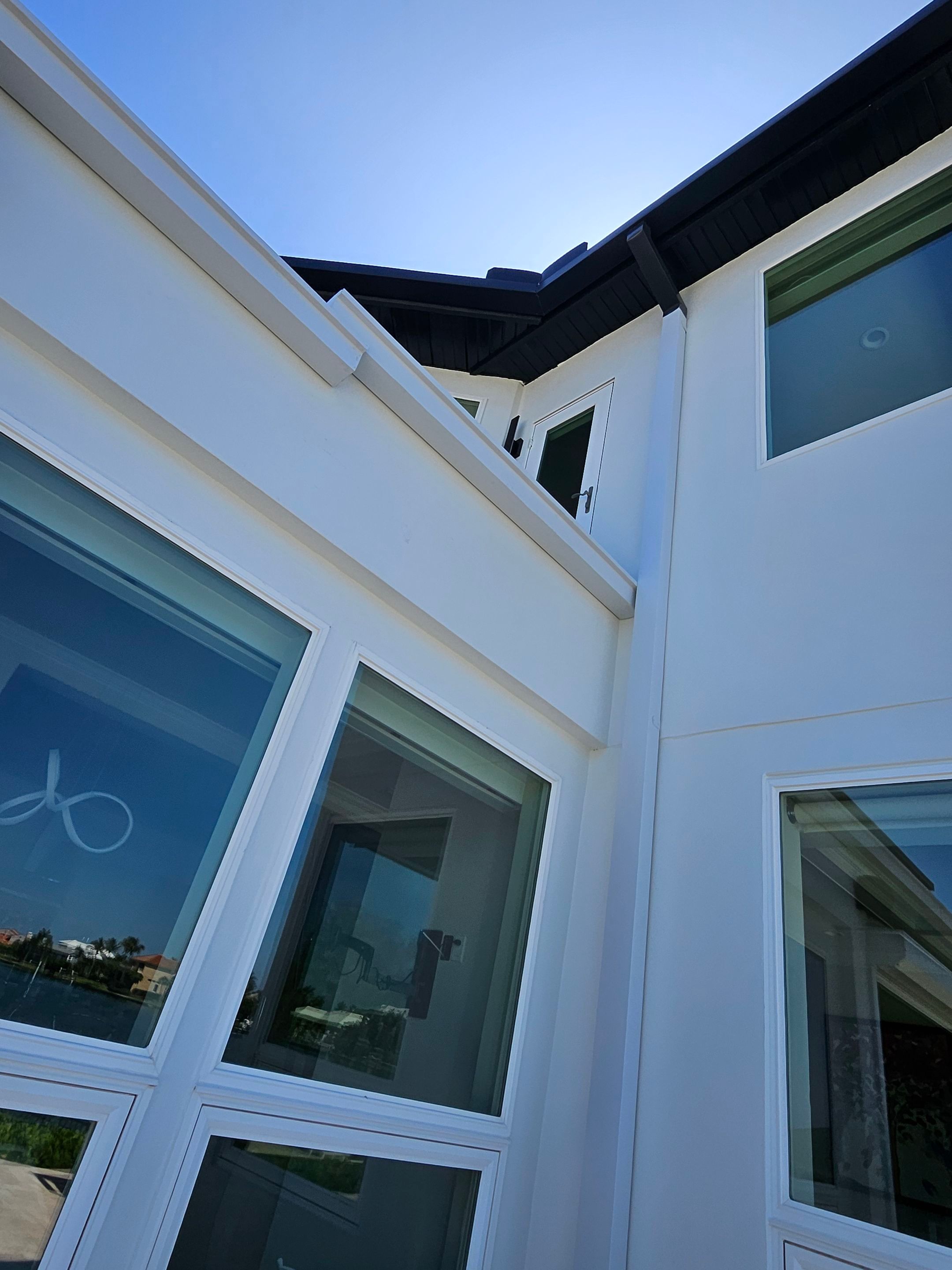 Soffit and Fascia Installation and black seamless gutters in Sarasota FL by Gutter Professors