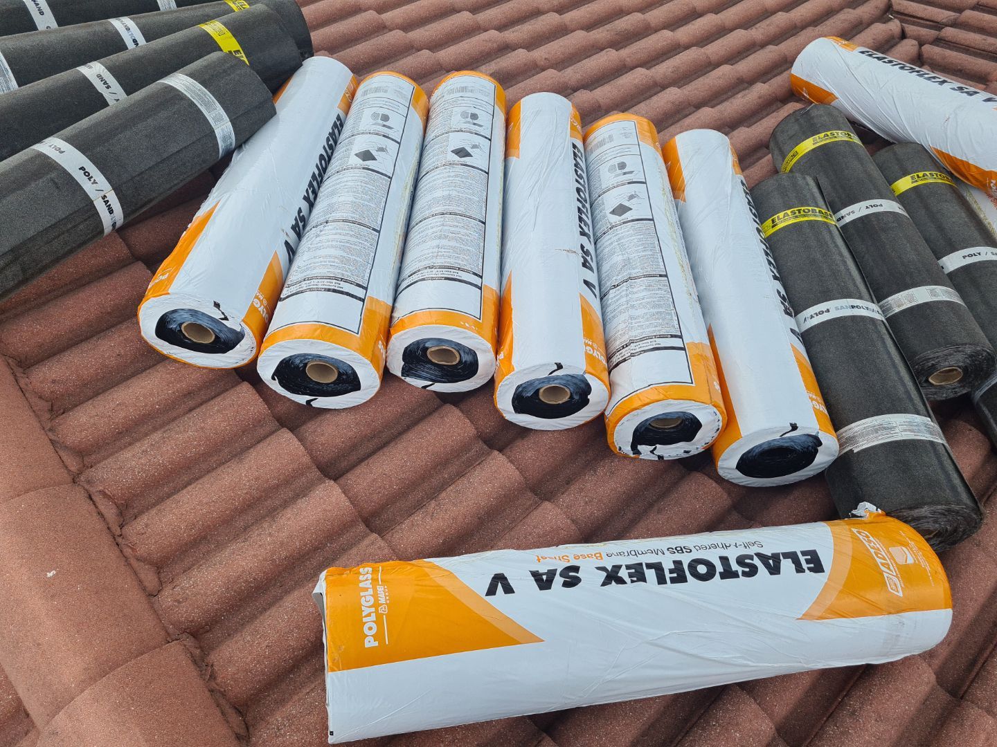 Residential Roofing Installation using 1" Nail strip metal roof by BLUES BROTHERS CONSTRUCTION CORP