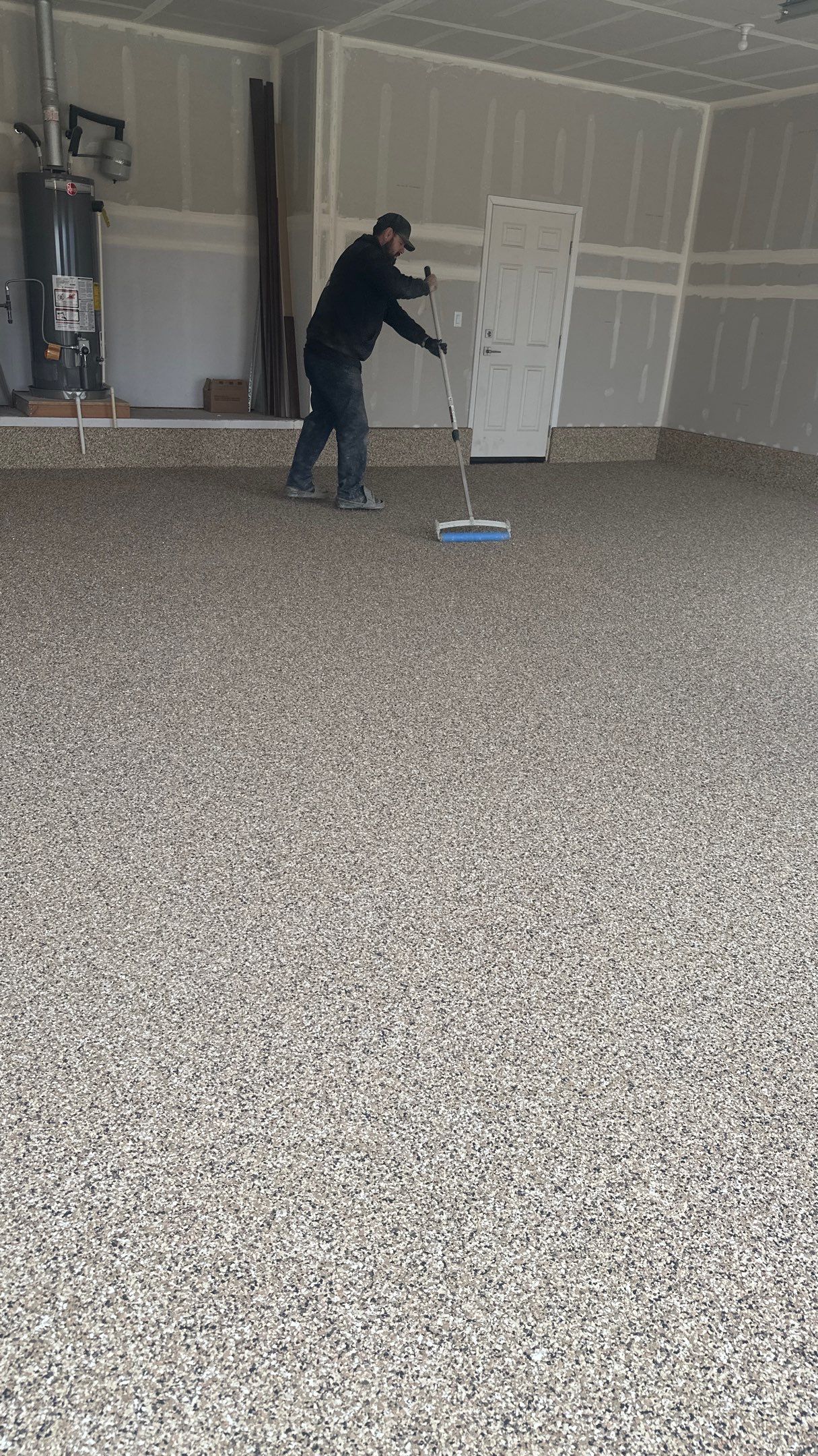 Garage Transformation using Sandstone by Croc Coatings, LLC