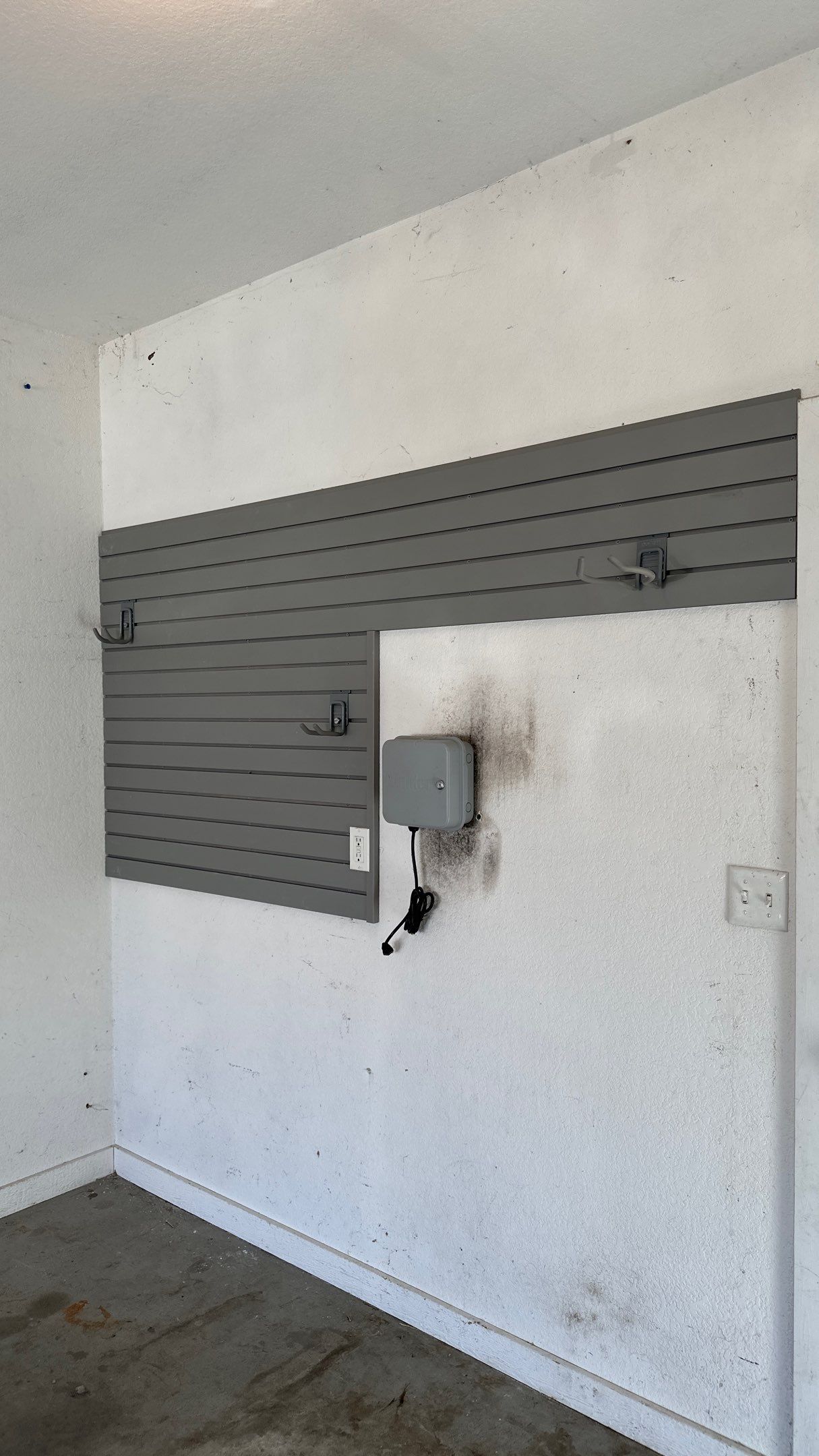 Melissa L. upgraded her garage with slatwall and overhead racks by Banner Garage