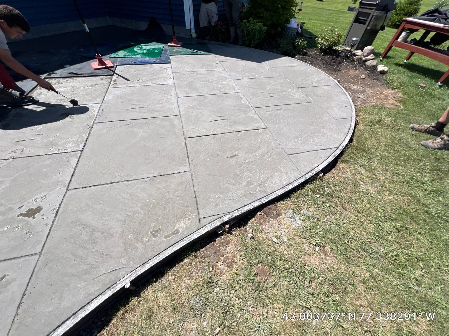 Slate stamped concrete patio  by NG Masonry & Construction LLC
