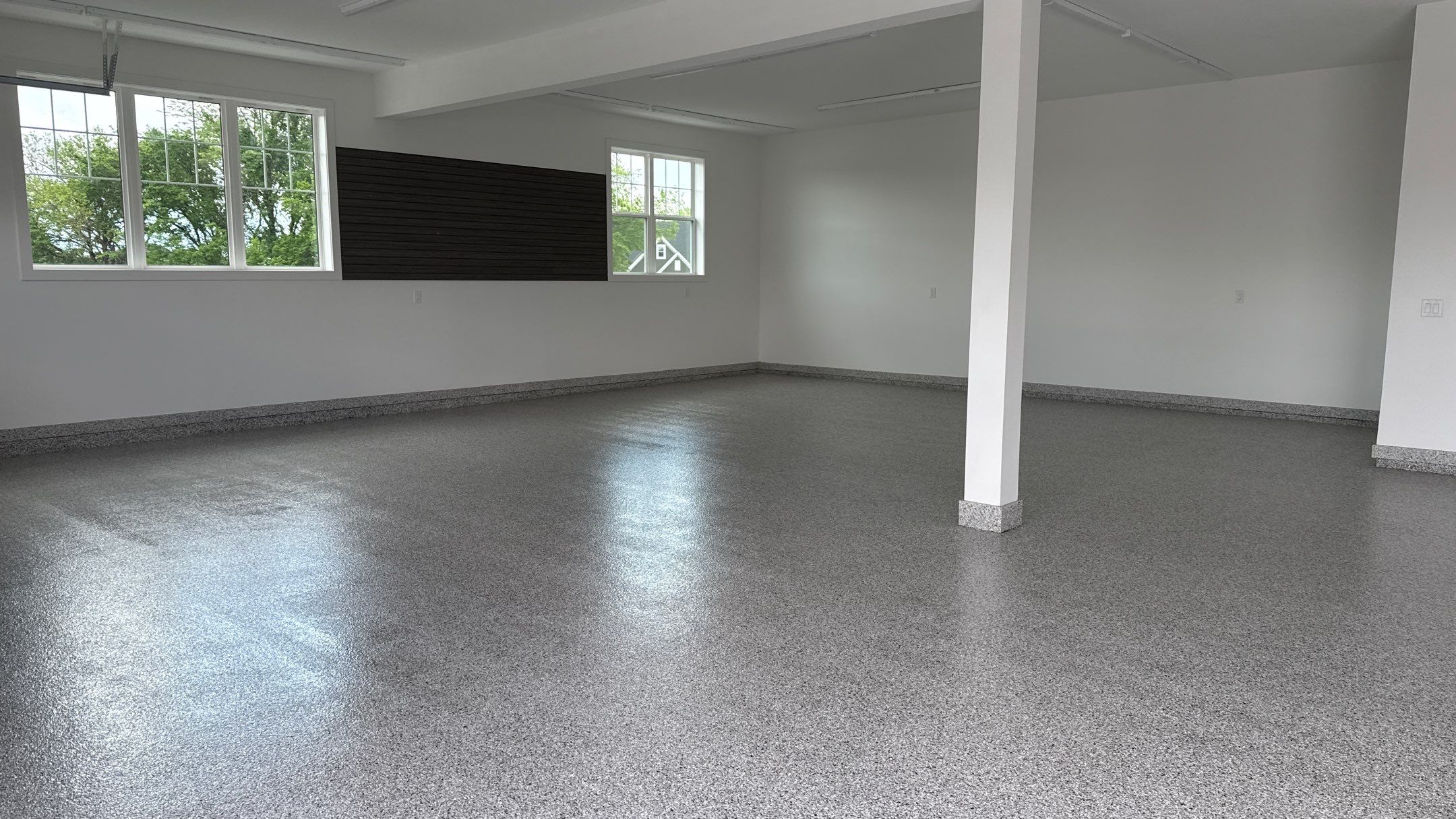 Christopher Has A Beautiful New Floor  by Banner Garage