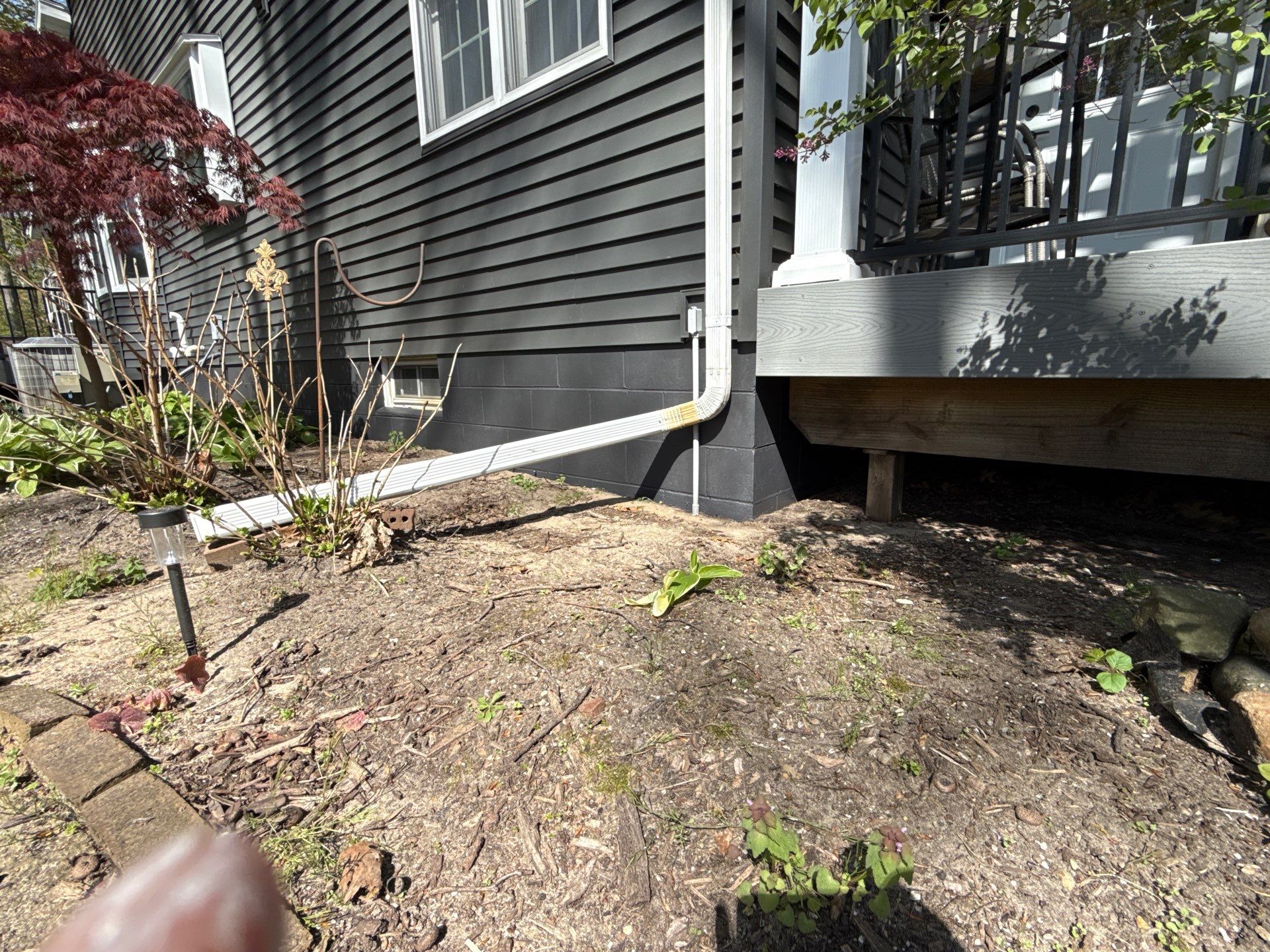 Exterior Foundation Painting in Muskegon Michigan by Gordon Painting