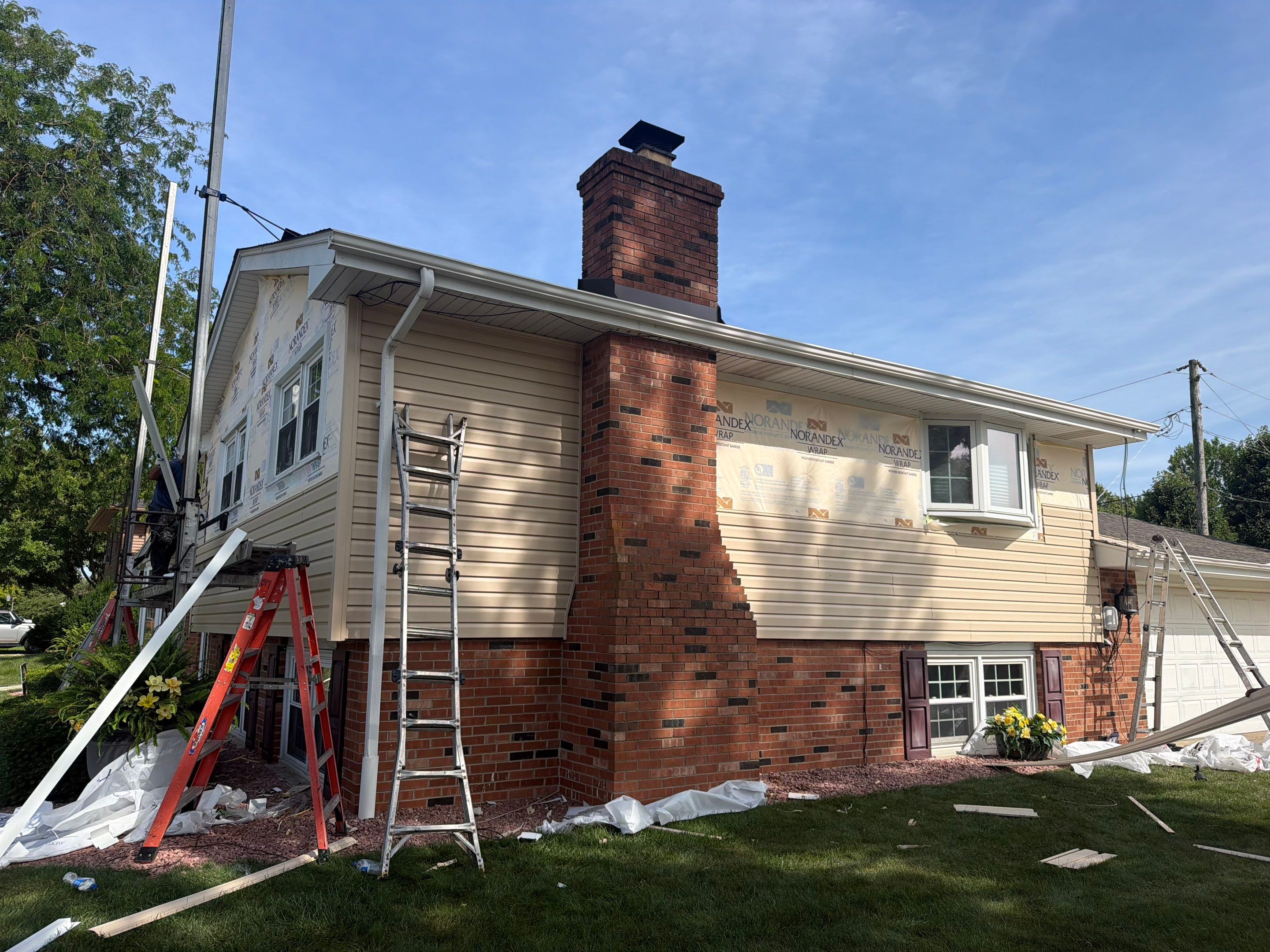 Roof, gutters, windows & siding replacement by Optimal Home Improvement 