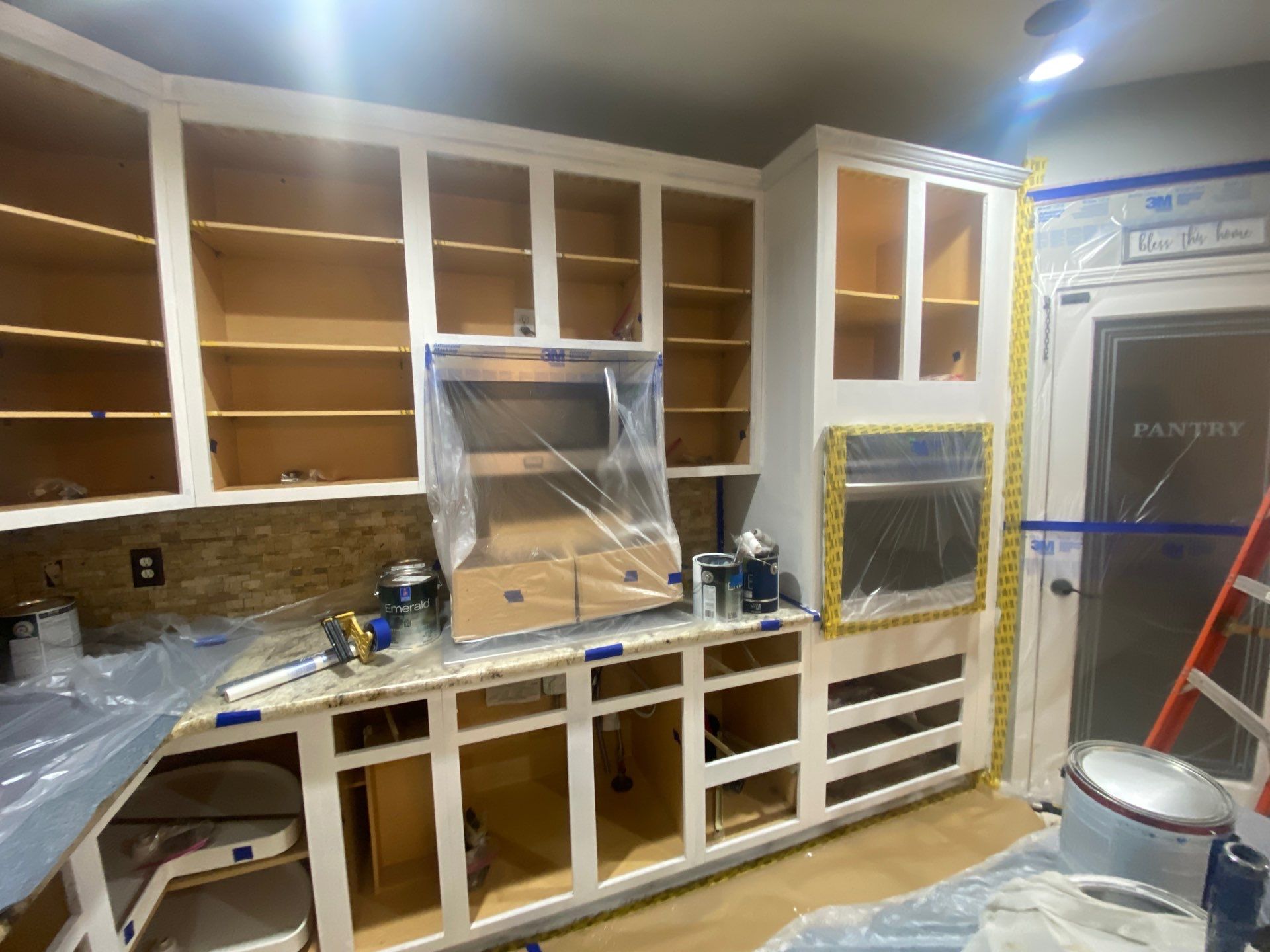 Kitchen Cabinet Refinishing by Top Shelf Painter
