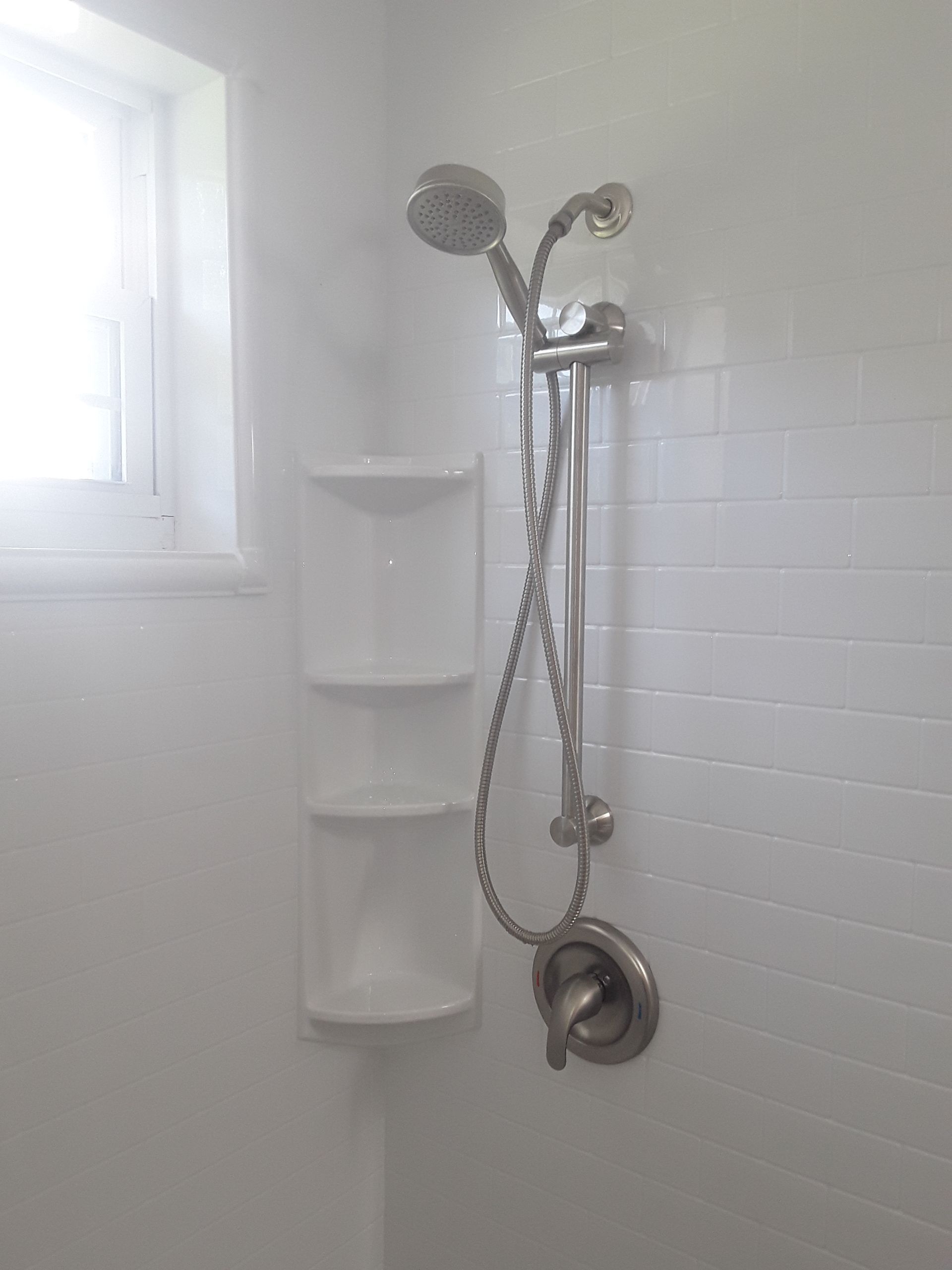 Tub to Shower Conversion using BCI Acrylic Shower System by Secure Construction Company Inc