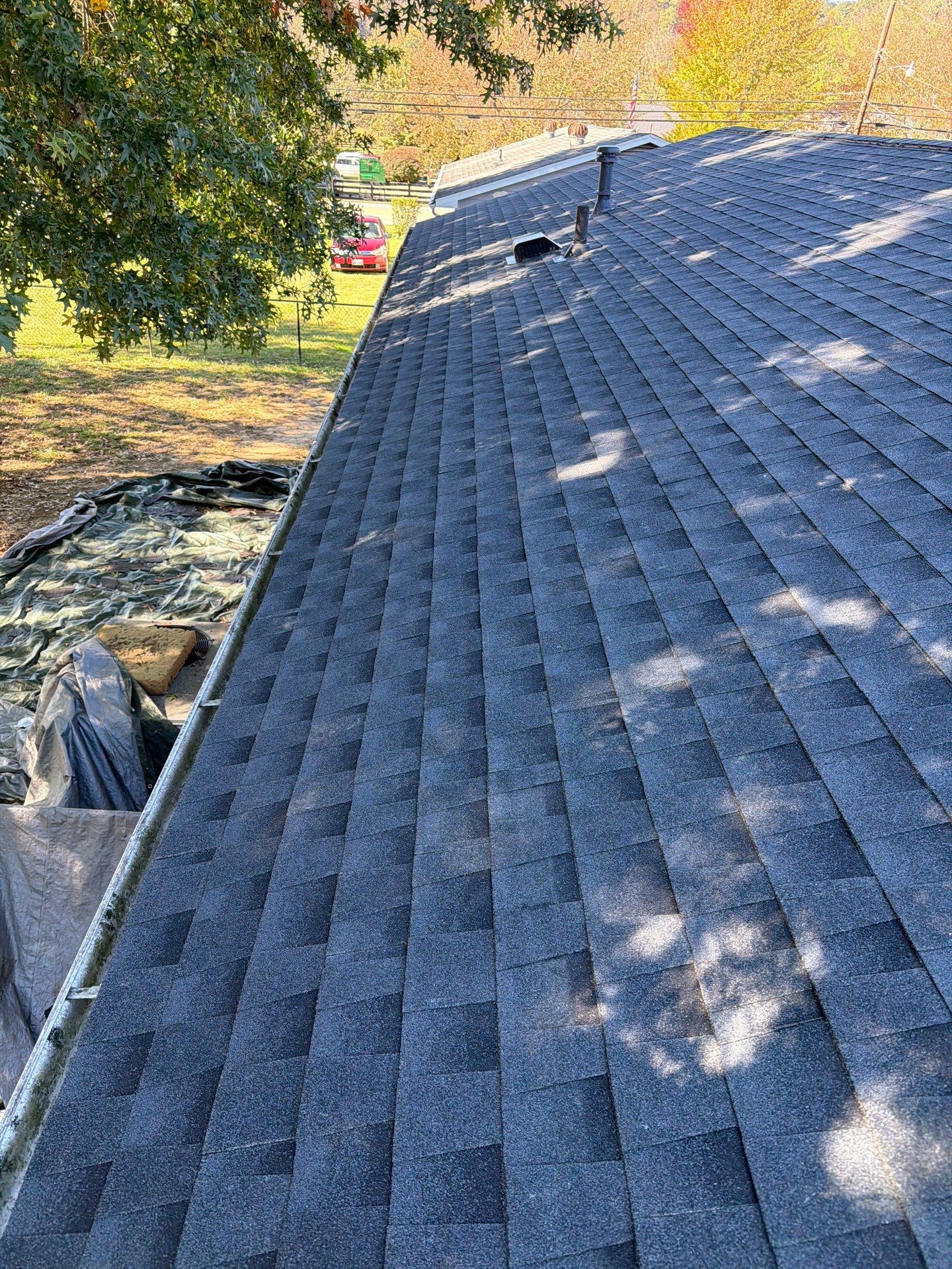 Residential Roofing Installation using GAF Timberline HDZ Charcoal by Rainstoppers Roofing