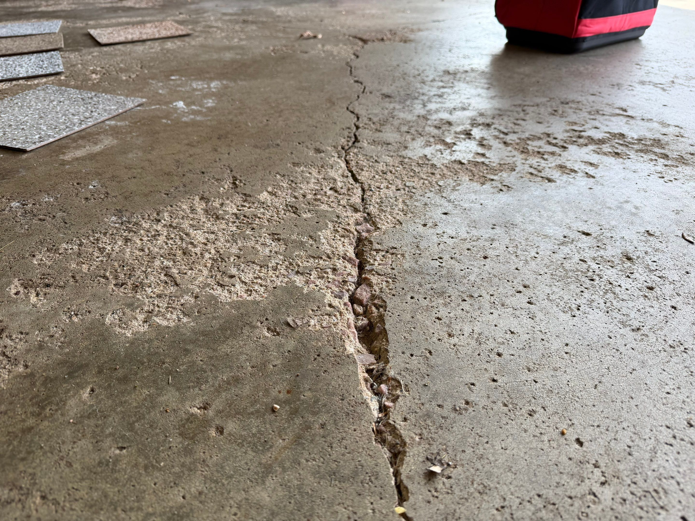 Sioux Falls Garage Epoxy Floor Installation and Concrete Crack Repair by Select Painting, Coatings & Garage Cabinets
