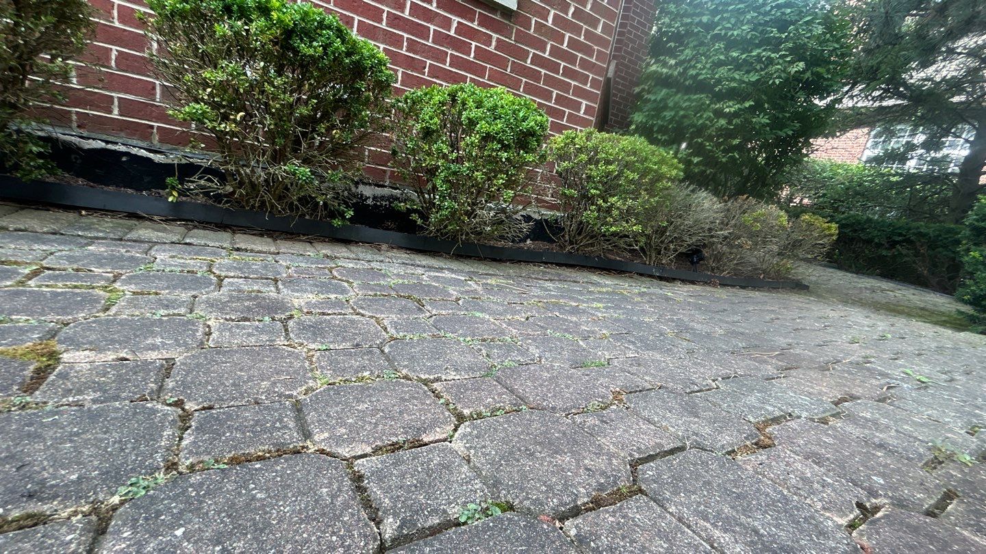 Brick paver repair, clean and seal by Northern Power Washing LLC.