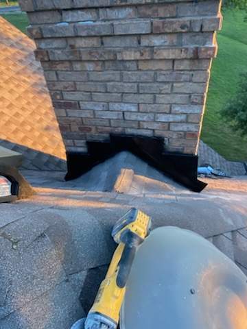 Cricket and Flashing Repair  by Rhino Roofing and General Contracting, LLC