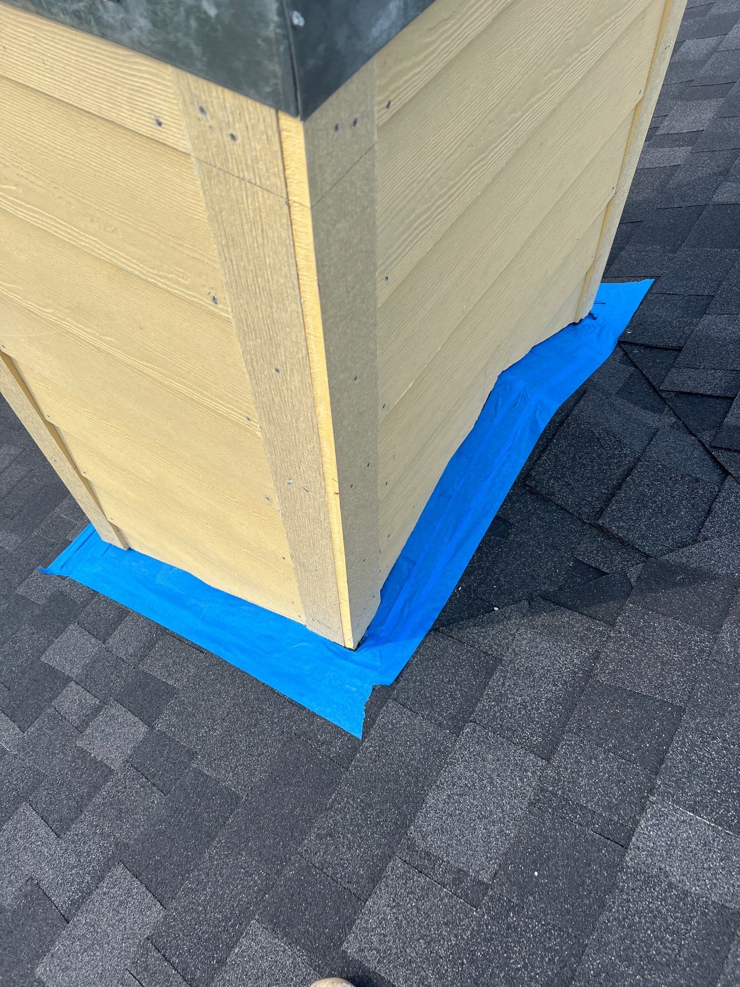 Nothing looks nicer than a little black roof by Bayfront Roofing and Construction