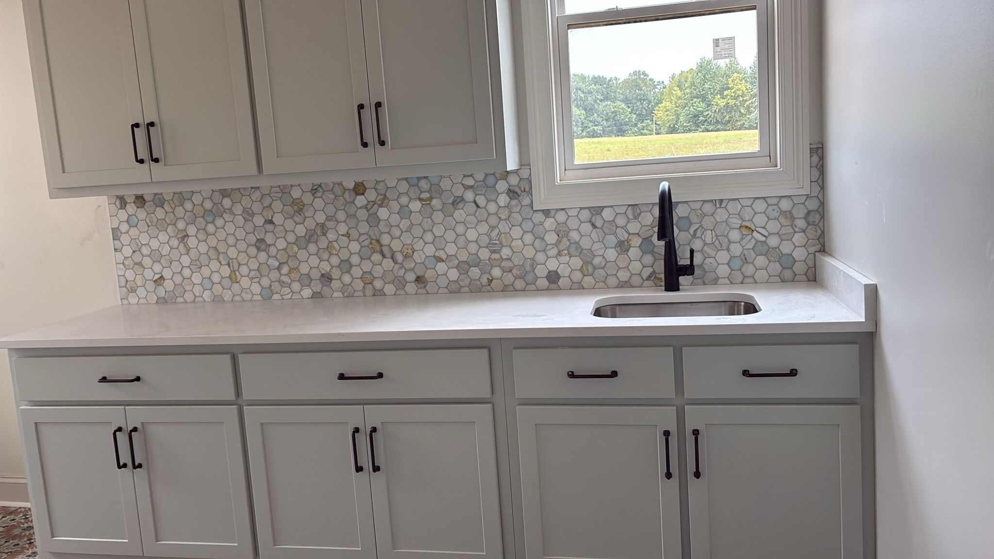 New backsplash by Knockout Flooring LLC