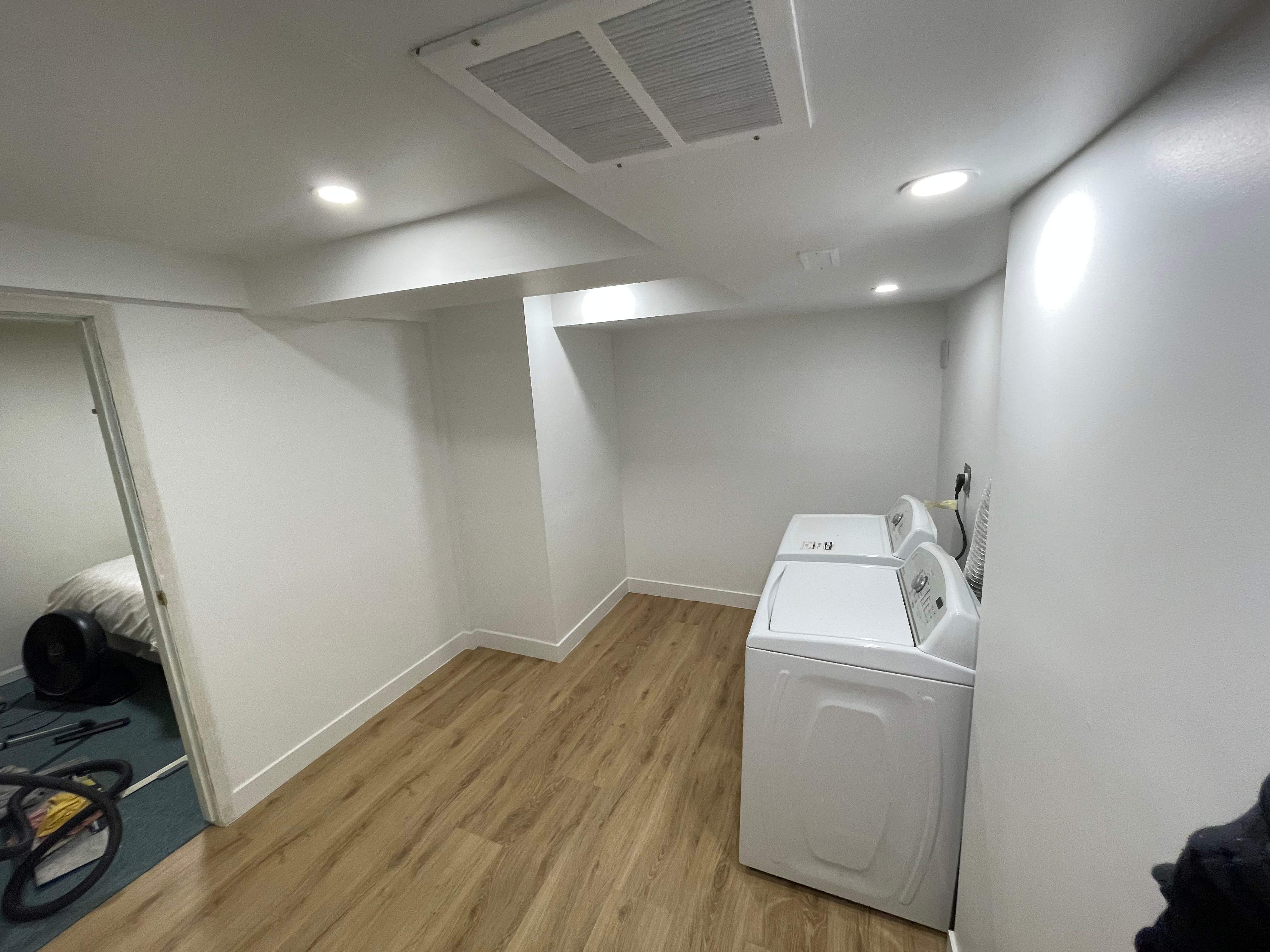 Laundry Room Renovation by YVR Construction Group
