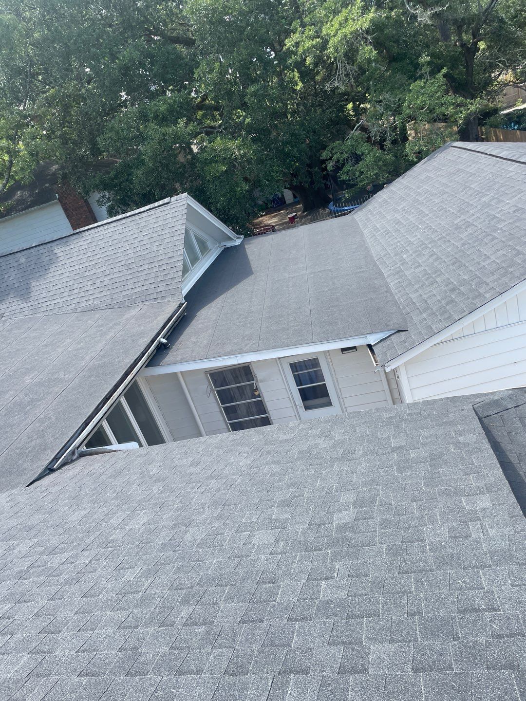 Residential Roofing Installation using Roof Replacement by American Roofing & Construction LLC