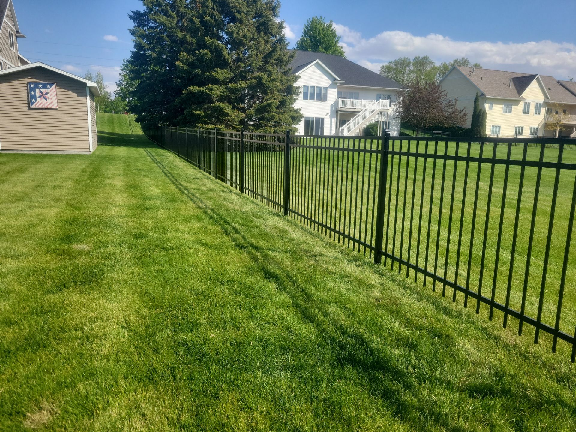 Black Ornamental Metal Picket Fence Installation in Waterloo by Perfect Picket Fence and Stain