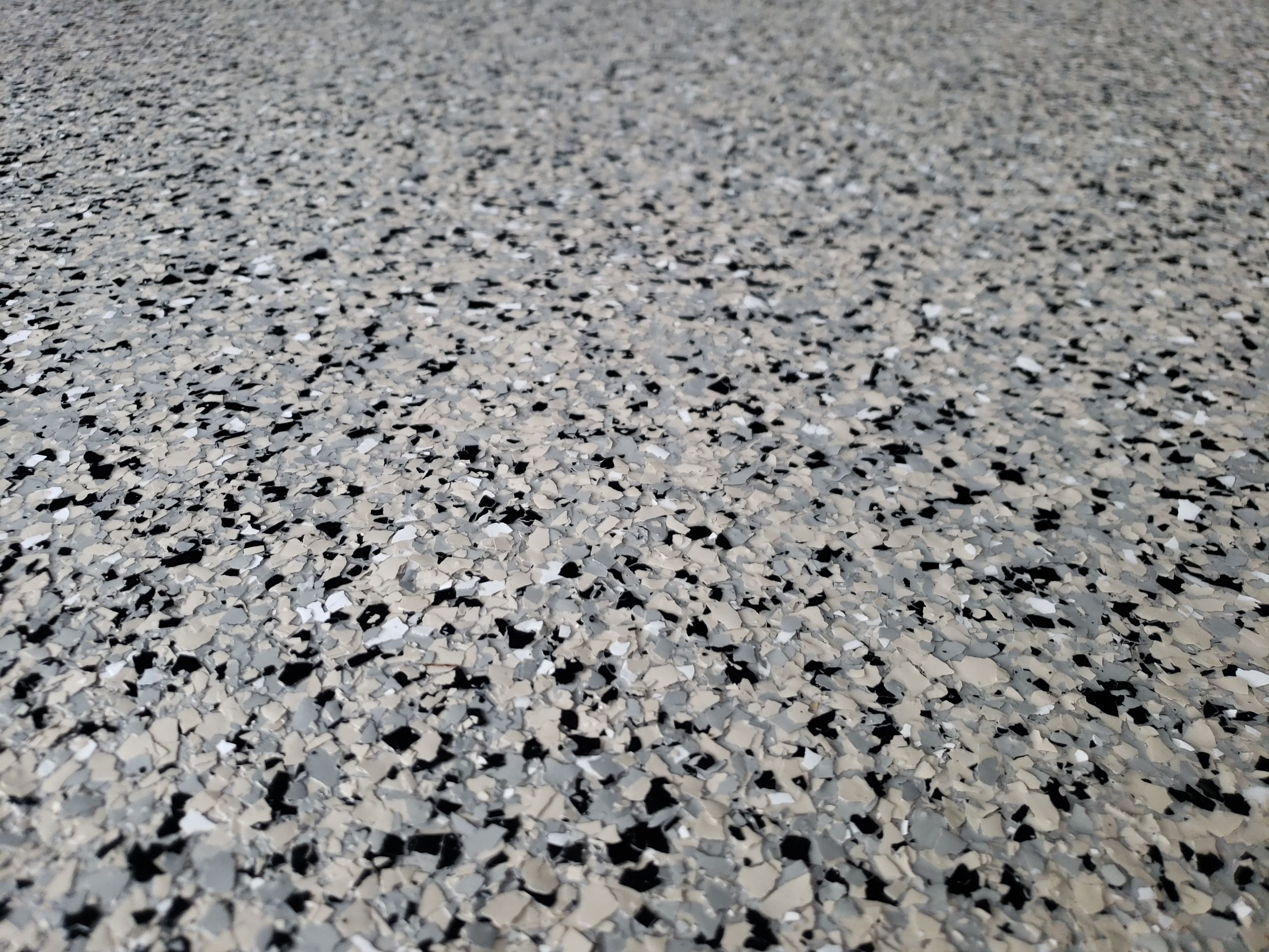 St. Joseph -- Front Patio and Garage Epoxy Garage Coating System by Big Red Decorative Concrete, LLC