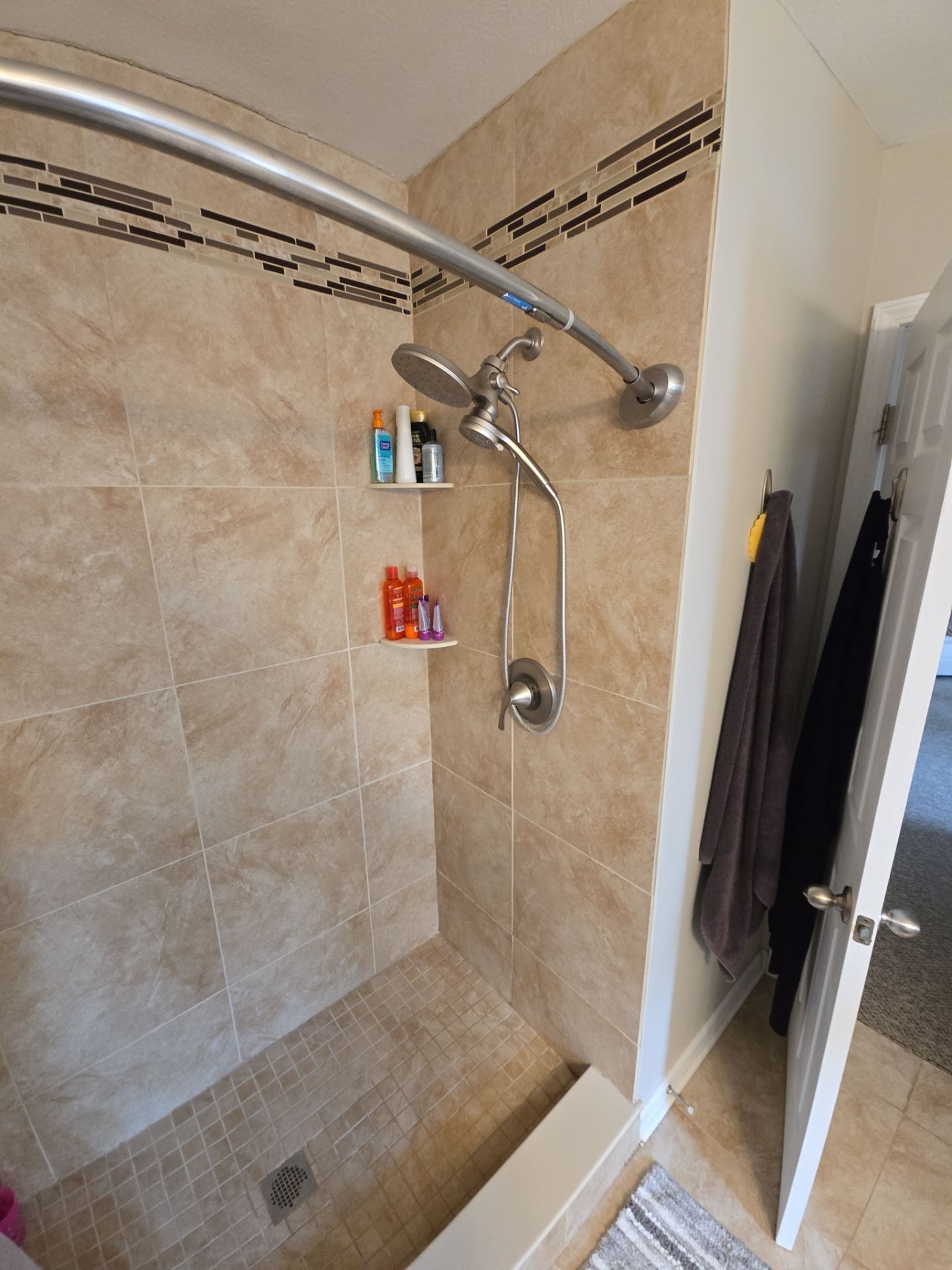 Custom Jacuzzi Walk-In Shower Remodel with Stone-Look Tile in Traverse City by Rainbow Seamless Systems