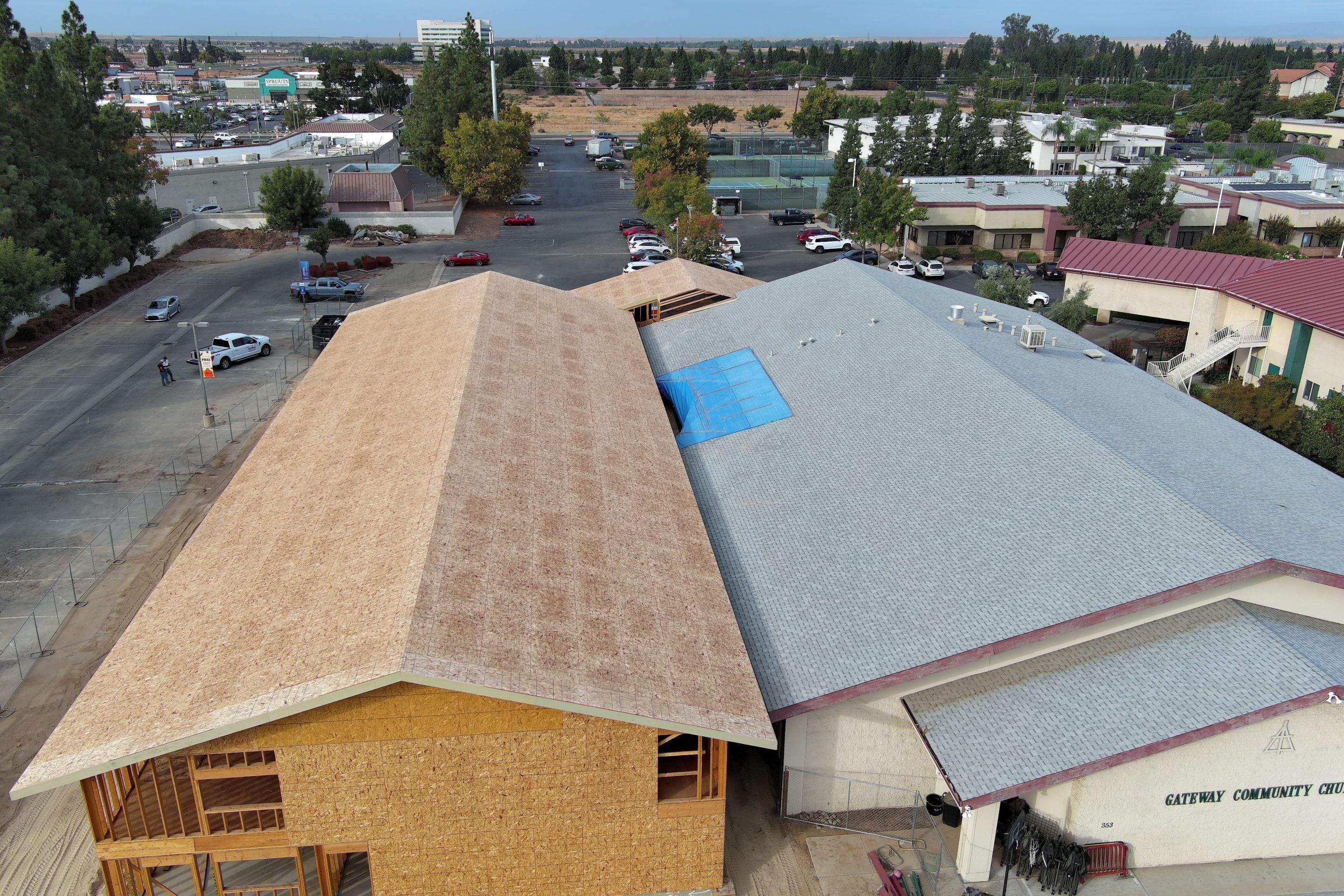 Metal roofing installation on church by Straight Edge Roofing Inc