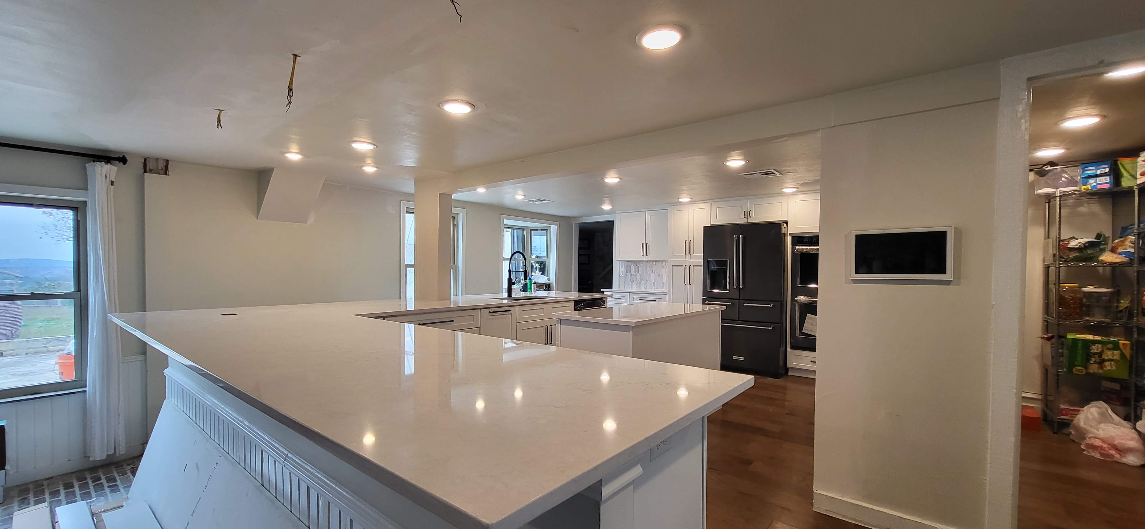 Boerne Kitchen Remodel with Quartz Countertops and White Shaker Cabinets by Legacy Bath and Kitchen