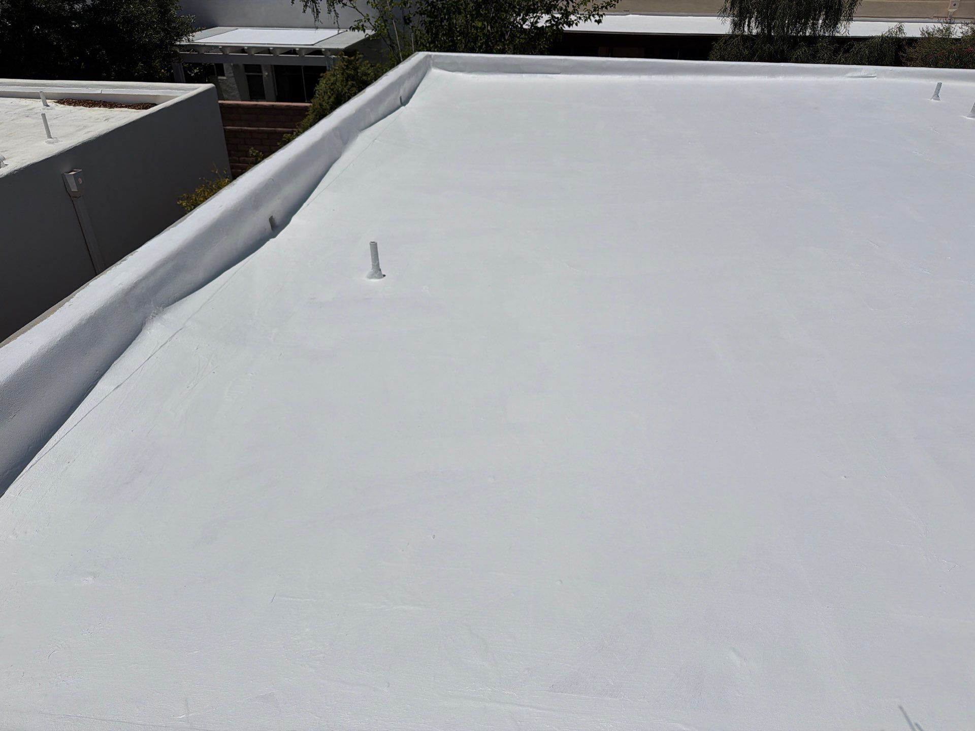 Tucson Residential Roof Restoration with Tile and Elastomeric Coating by West Coast Roofing AZ