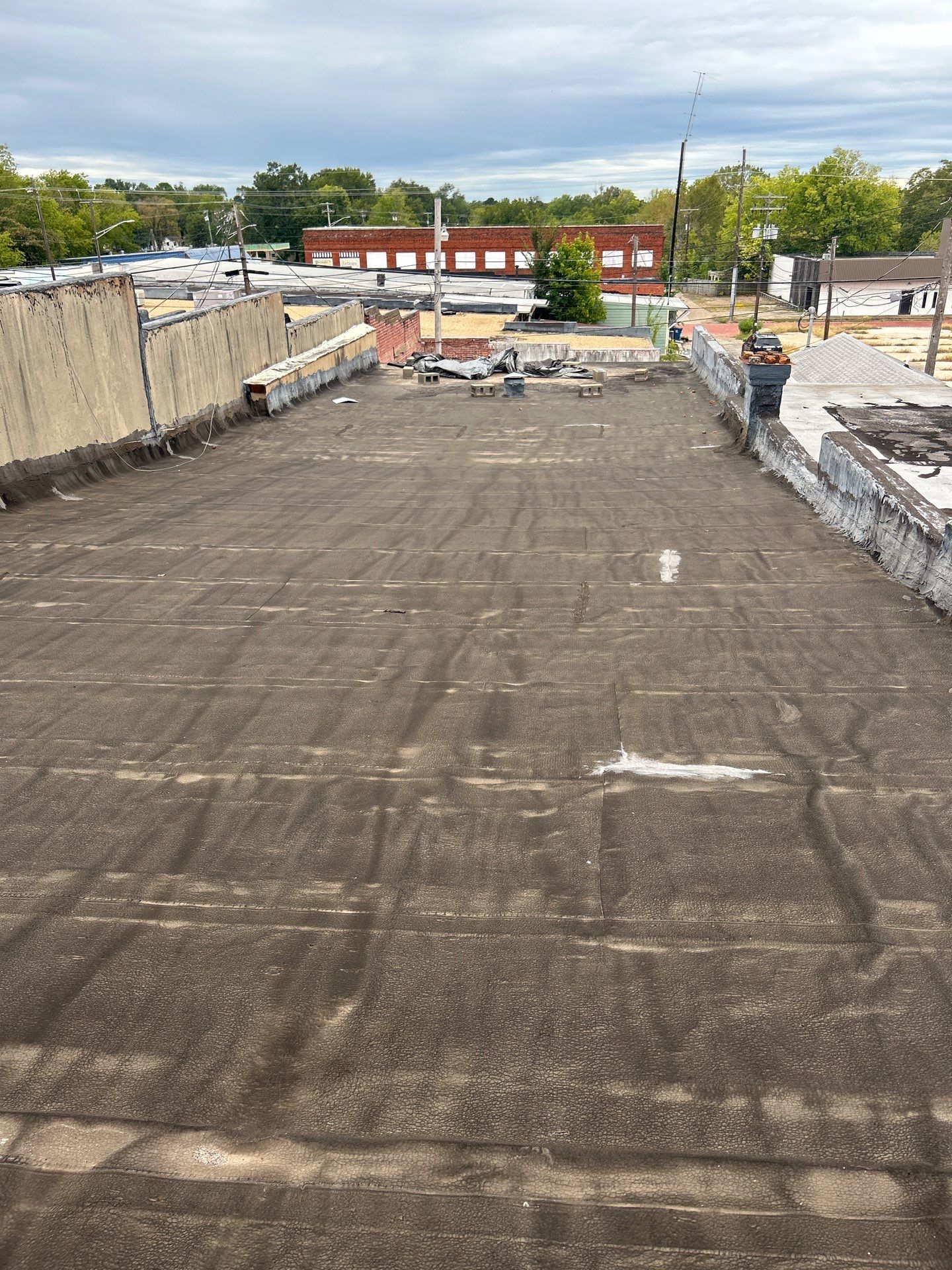 Downtown Gladewater Commercial Foam Roof Restoration – SPF + High-Tensile Acrylic by All Star Roofing LLC