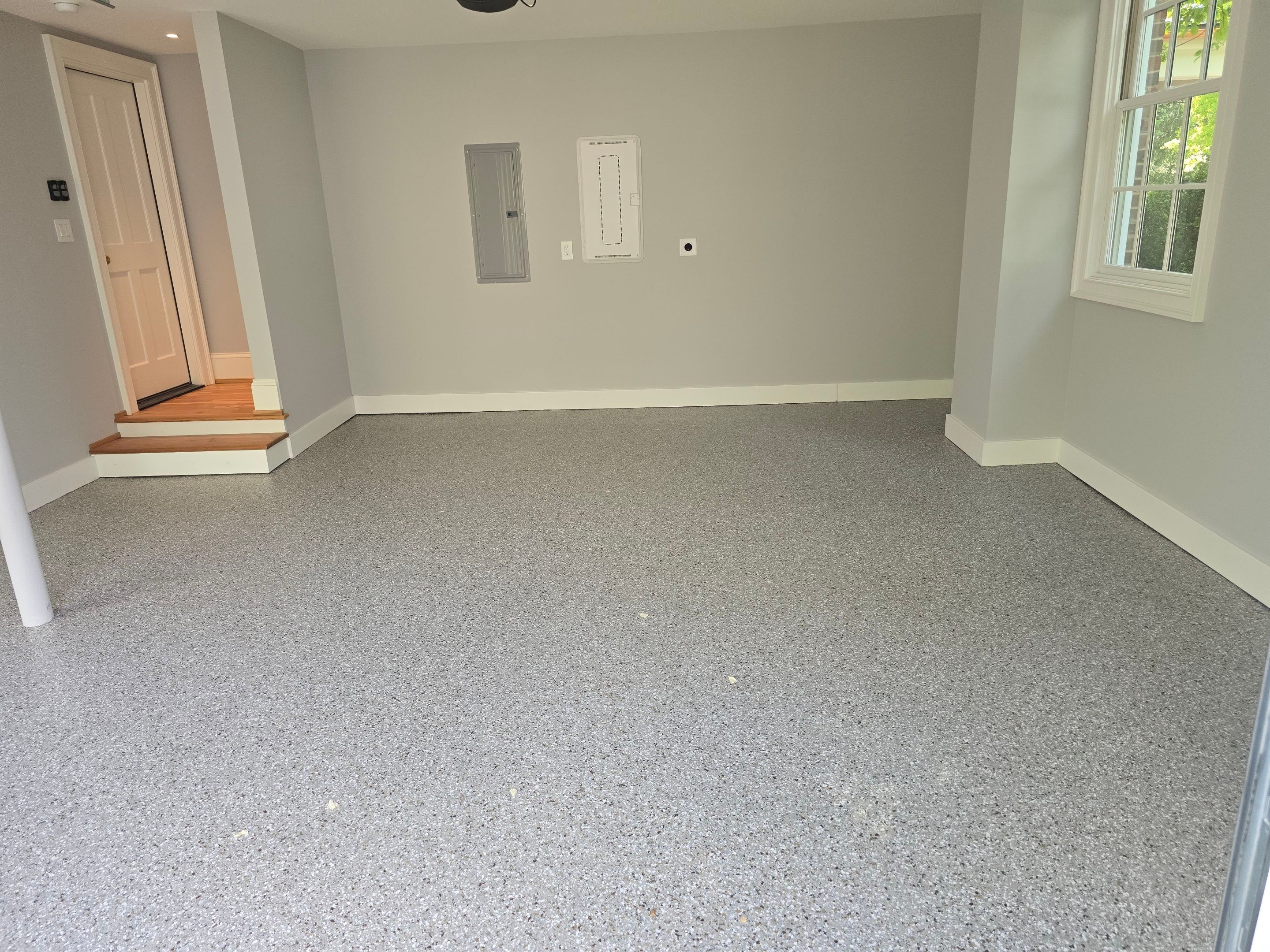 Two Garages Using Creekbed  by Elite Floor Solutions