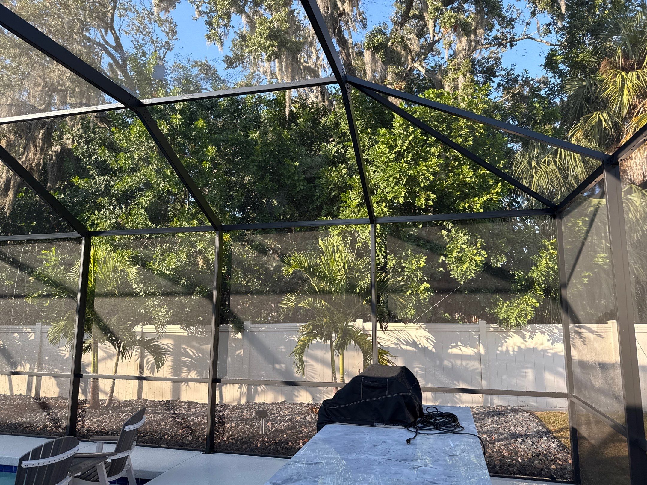 Painted Pool Deck & Screen Enclosure Cleaning | Heron Creek, Palmetto FL by Sunshine AquaWash